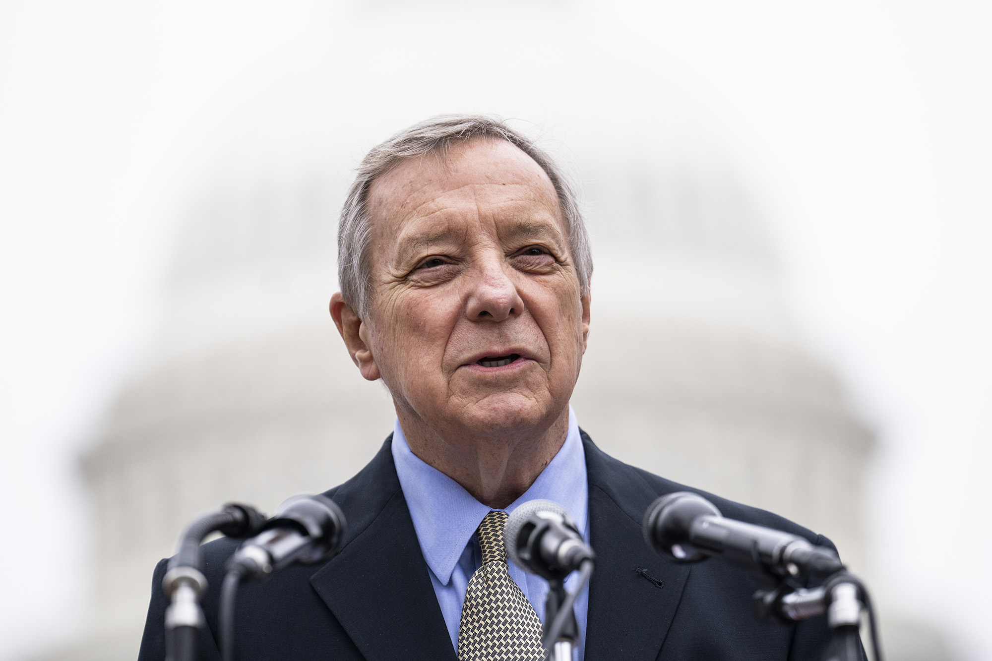 Sen. Richard Durbin, D-Ill., speaks during a rally with health care providers and the March Fourth Coalition outside the U.S. Capitol on December 7.