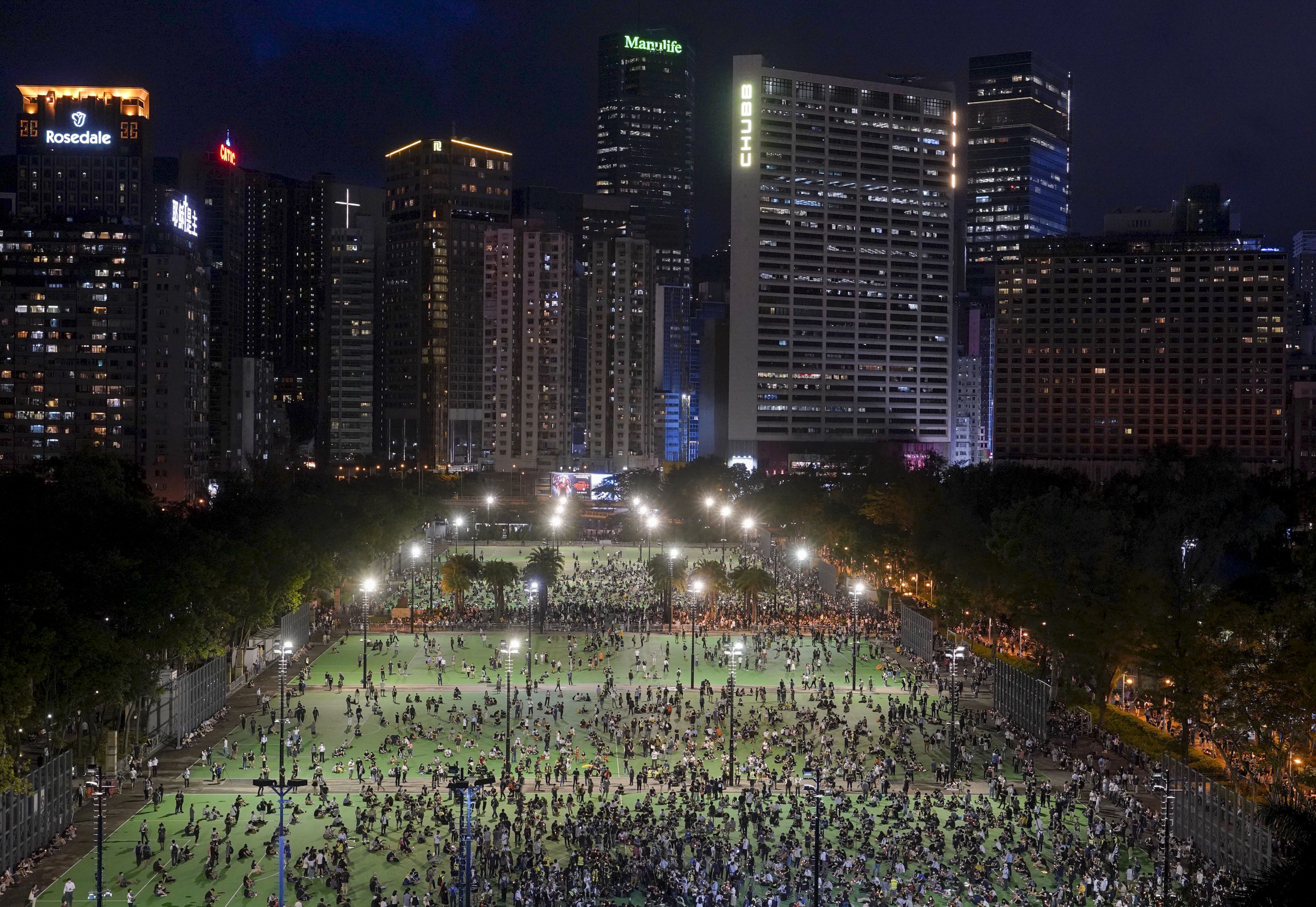 People gather on June 4 at Victoria Park in Hong Kong, for a vigil to remember the victims of the 1989 Tiananmen Square massacre.