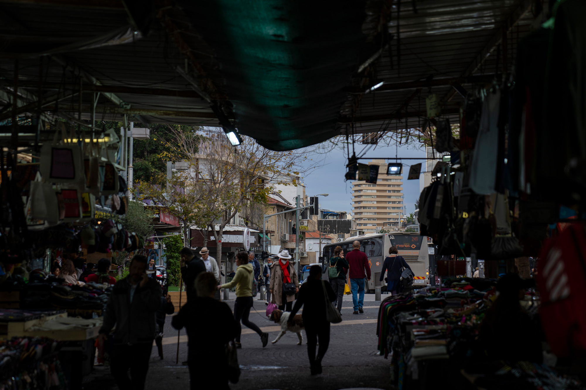 People shop in a market in Tel Aviv, Israel, on January 4.