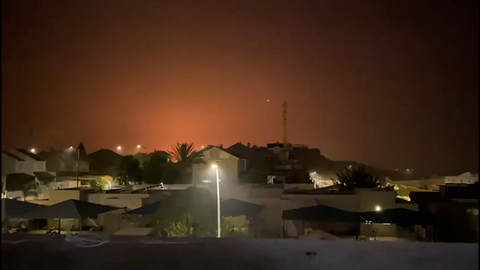 A still from a video shows flashes on the horizon, as seen from Sderot, Israel, on October 28.