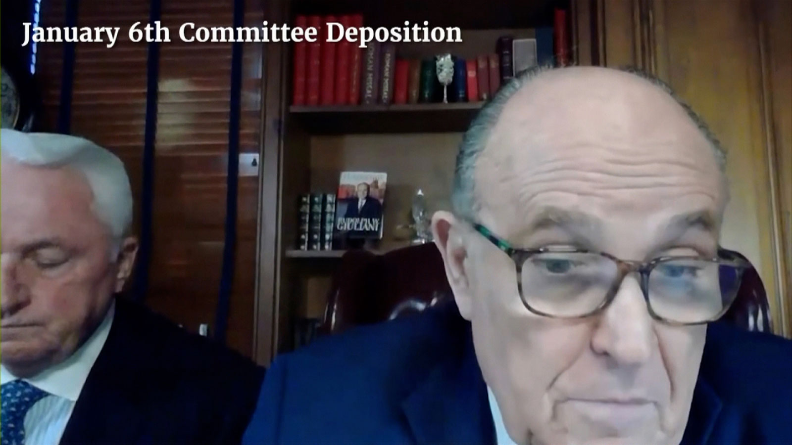Former President Trump's attorney Rudy Guliani is shown in a pre-recorded video on Thursday during the hearing. 