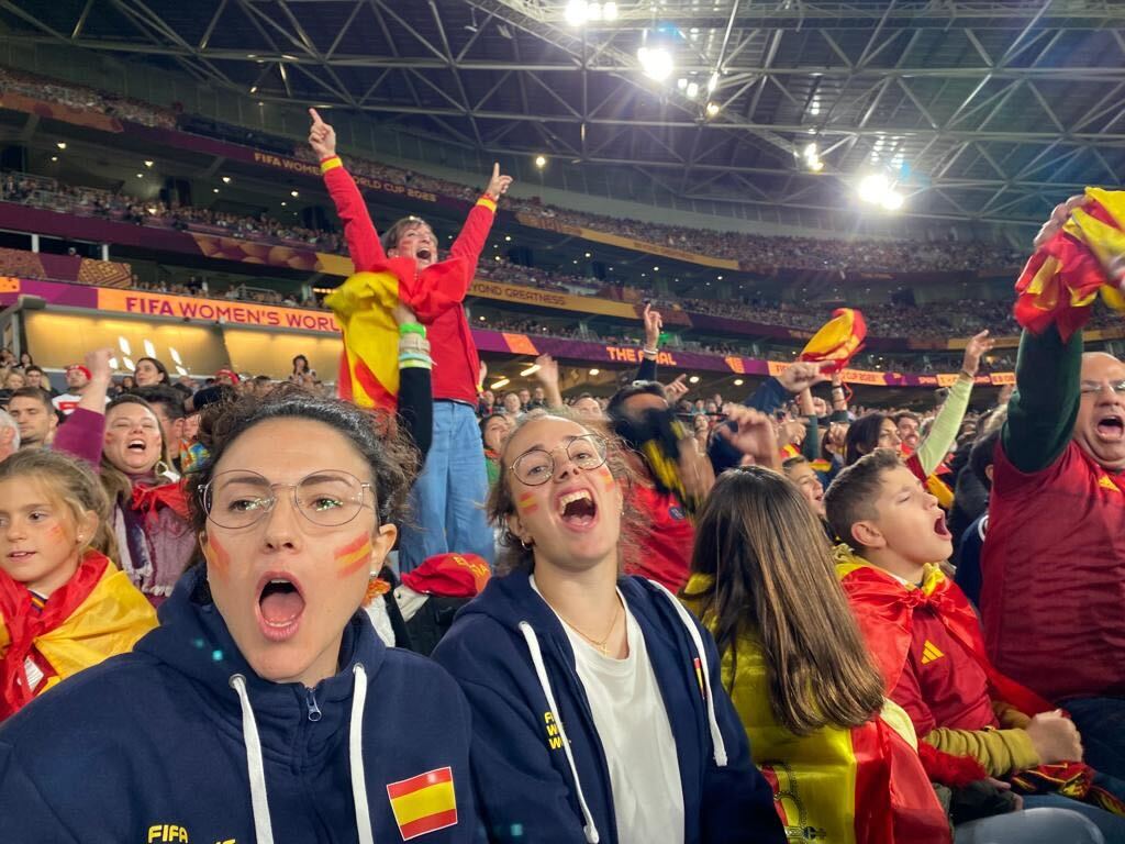 One ecstatic Spain fan leads chanting in the stadium.