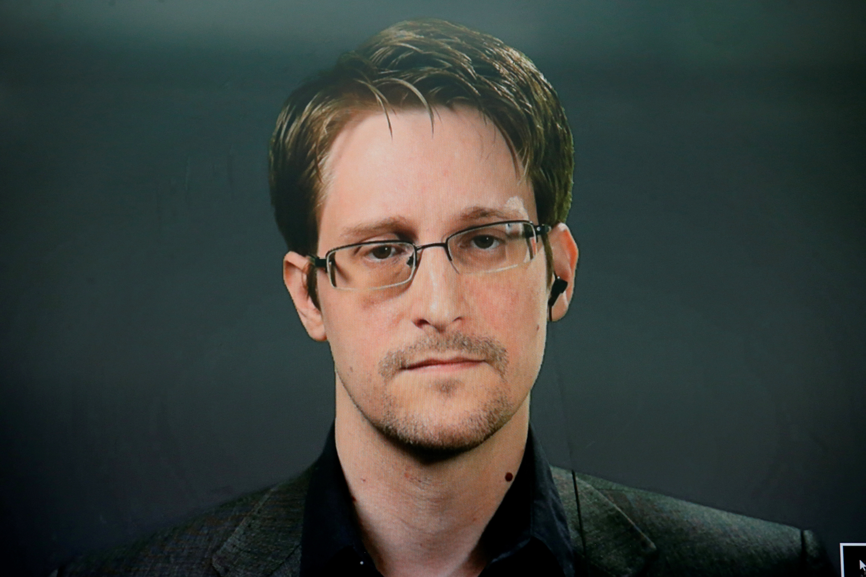 Edward Snowden speaks remotely during a news conference in New York City on September 14, 2016.