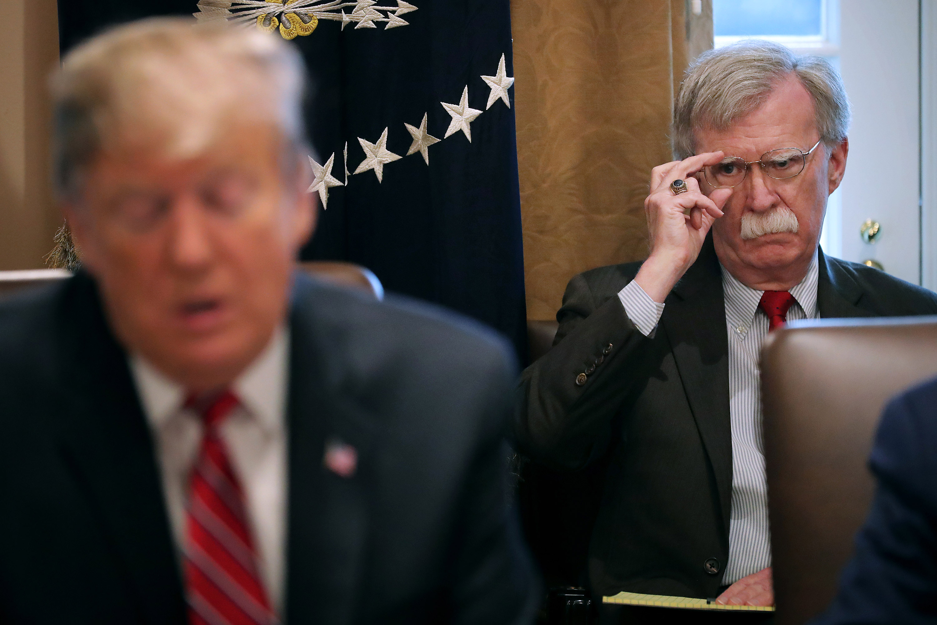Trump and Bolton are debating how to handle the tensions.