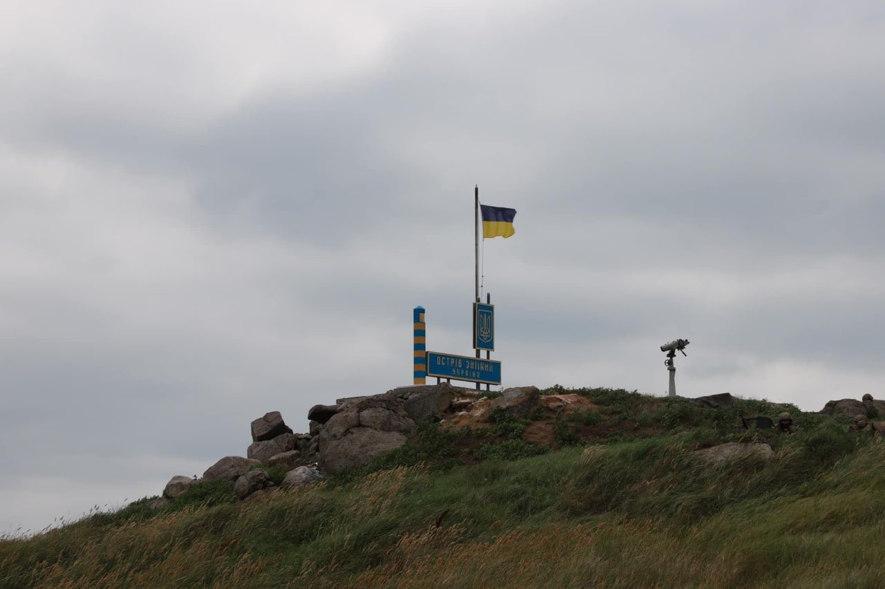 The Ukrainian flag is hoisted on Snake Island on July 4 following the withdrawal of Russian troops last week.