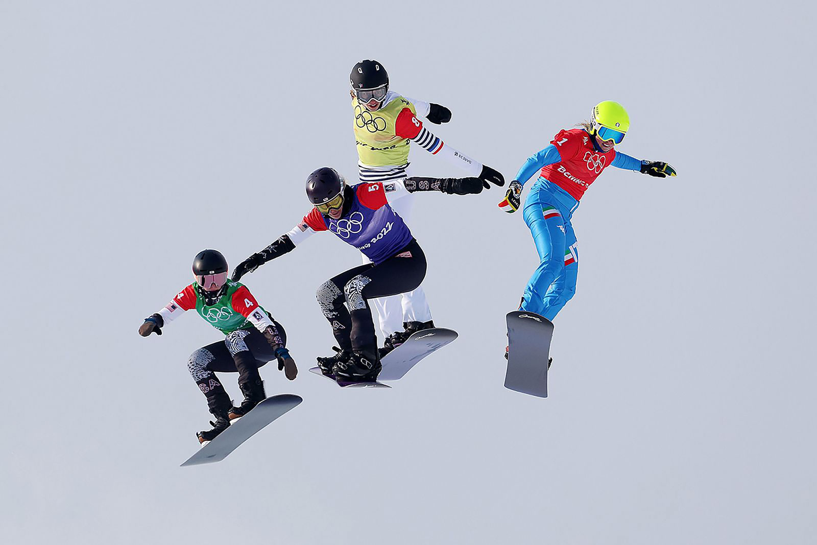 From left, the United States' Stacy Gaskill, the United States' Lindsey Jacobellis, France's Chloe Trespeuch and Italy's Michela Moioli compete in a snowboard cross semifinal on February 9. Jacobellis would go on to win the event, her first gold medal in her fifth Olympic Games.