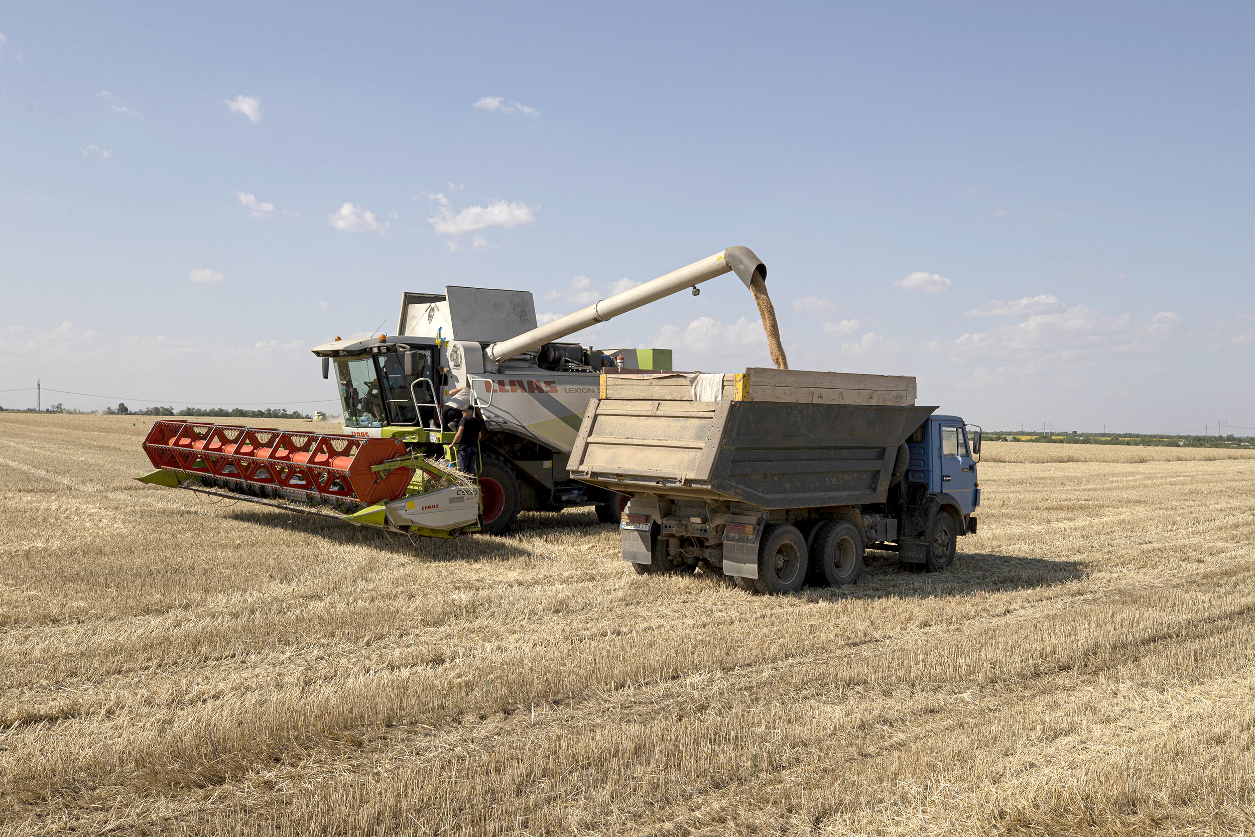 Farmers harvest grain in the fields of the Odesa region, Ukraine, on July 4.