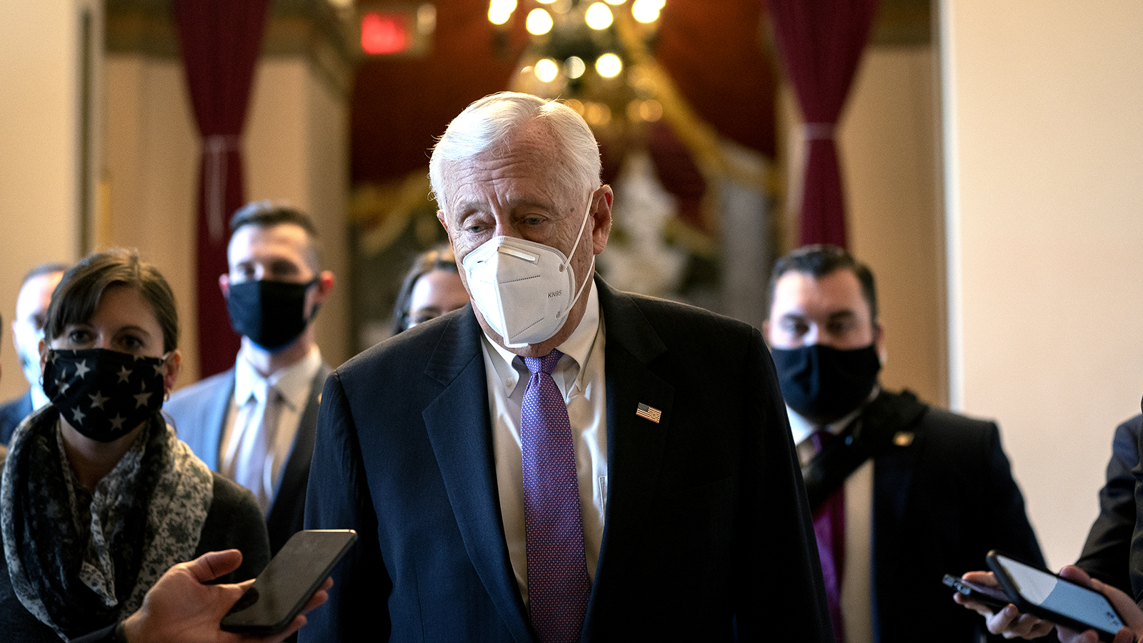 House Majority Leader Steny Hoyer speaks to reporters while walking to the House Floor at the US Capitol on January 13 in Washington.