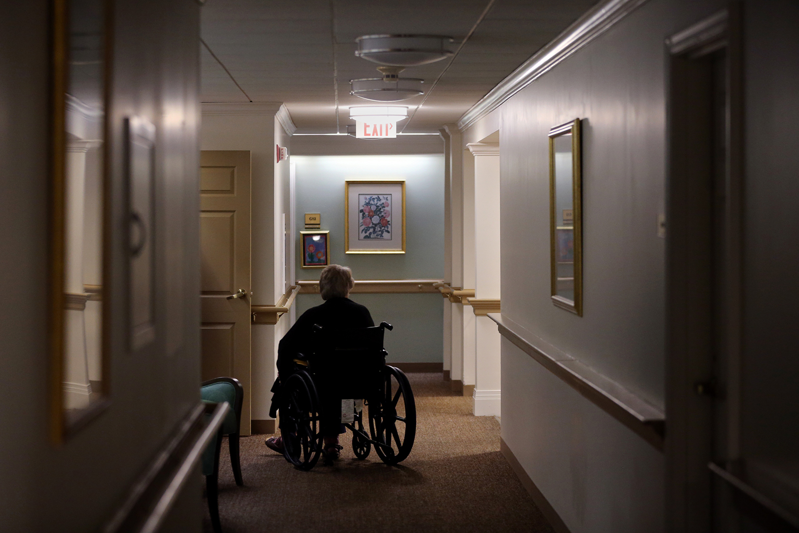 A resident in a wheelchair at an assisted living facility in Boston, on Sept. 2.