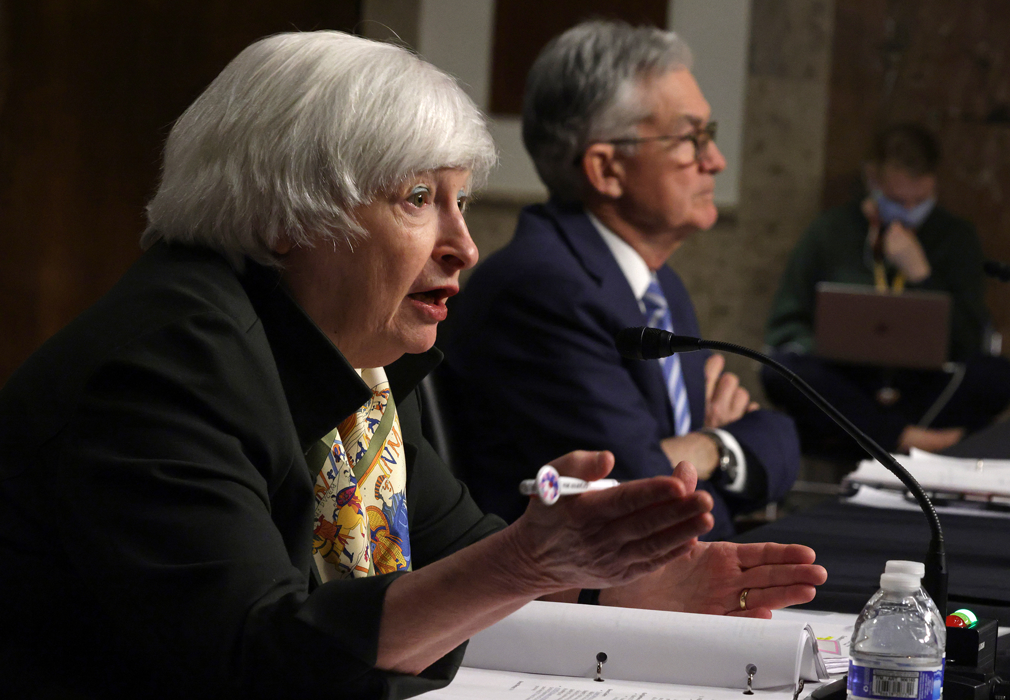 U.S. Treasury Secretary Janet Yellen (L) and Federal Reserve Board Chairman Jerome Powell (R) testified during a hearing before Senate Banking, Housing and Urban Affairs Committee on Capitol Hill yesterday in Washington, DC.