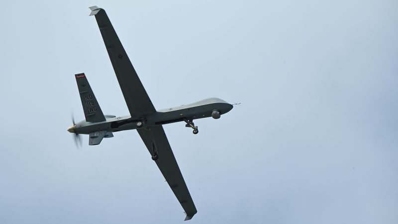 In this Feb. 21 photo, a U.S. Air Force 119th Wing MQ-9 Reaper fighter jet flies over an airfield at Andersen Air Force Base, Guam.