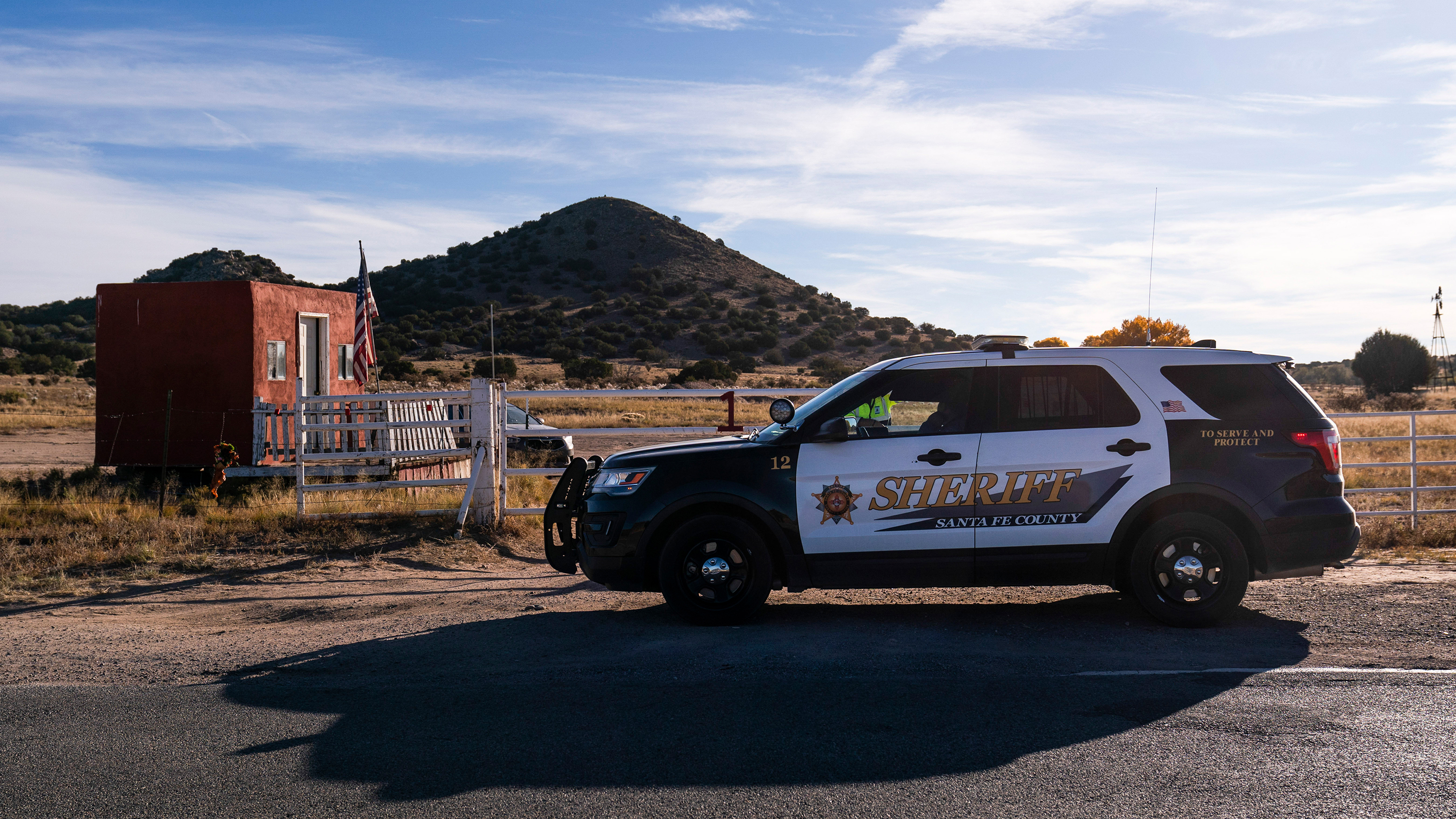 A Santa Fe County Sheriff's conveyance  is seen astatine  the entranceway  to the Bonanza Creek Ranch successful  Santa Fe, New Mexico, connected  Monday, October 25. 