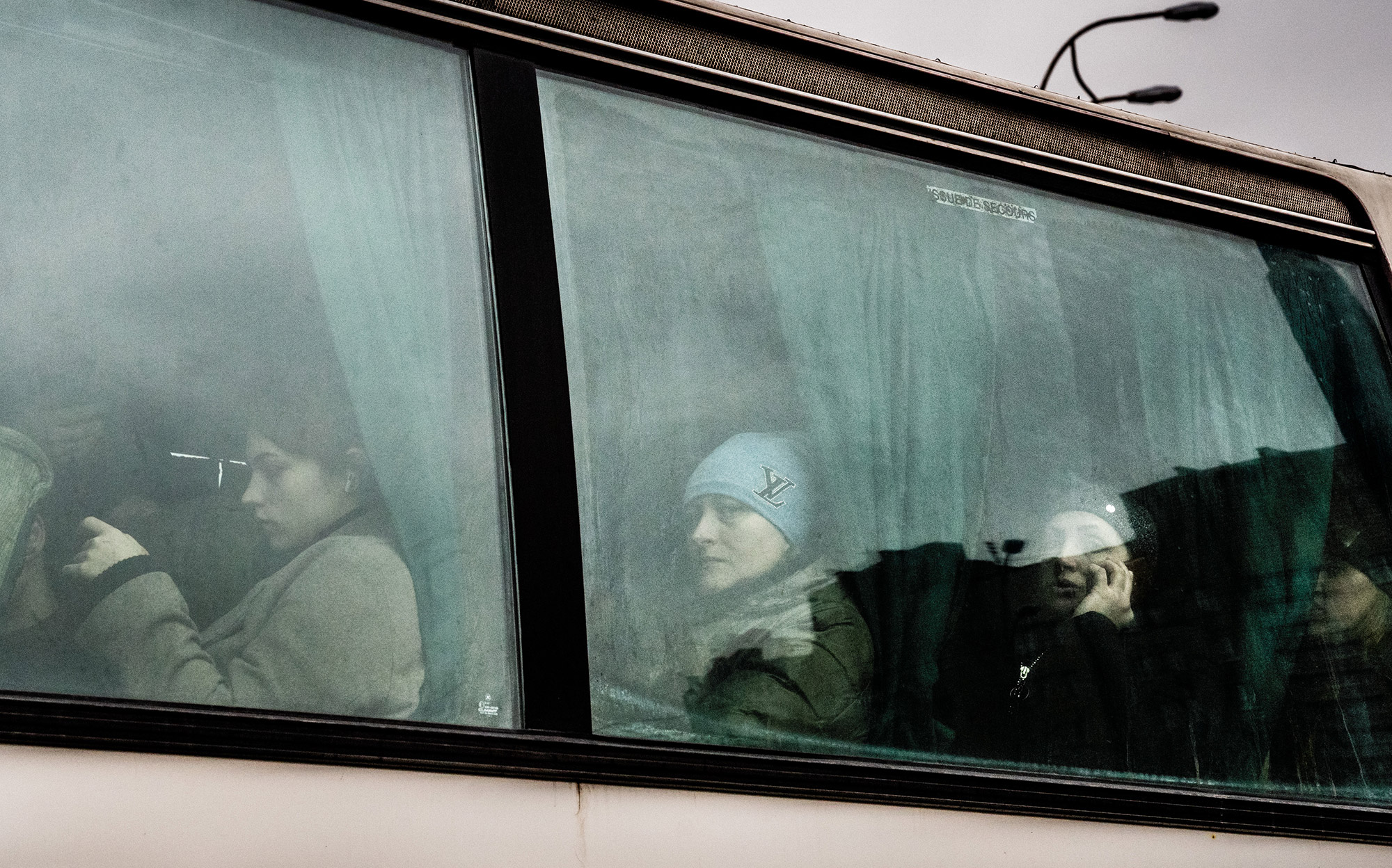 People on a bus leaving from the main bus station in Kyiv, Ukraine, on February 24.