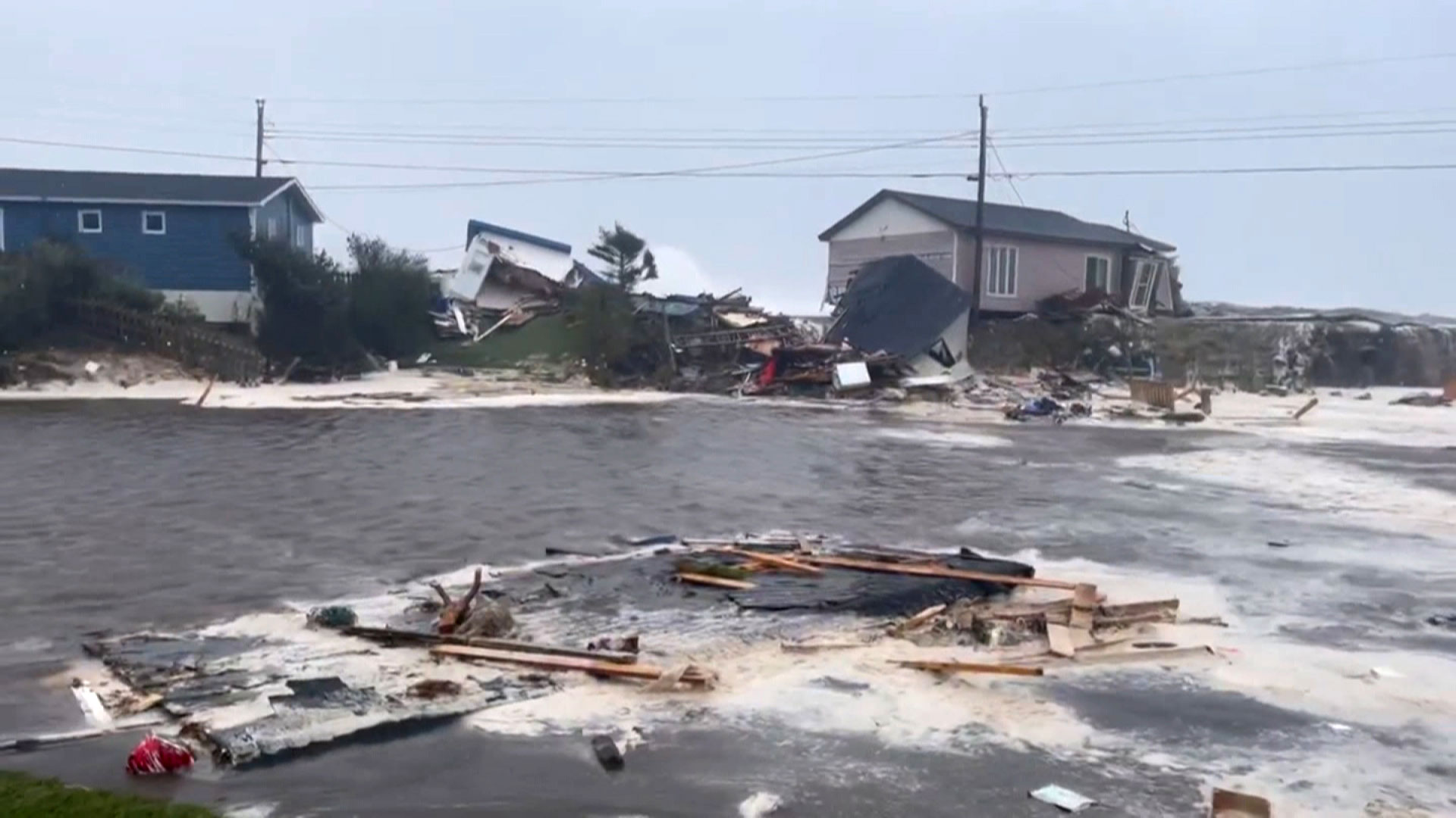 Damage and debris is seen in Burnt Islands, Newfoundland, on Saturday, September 24. 