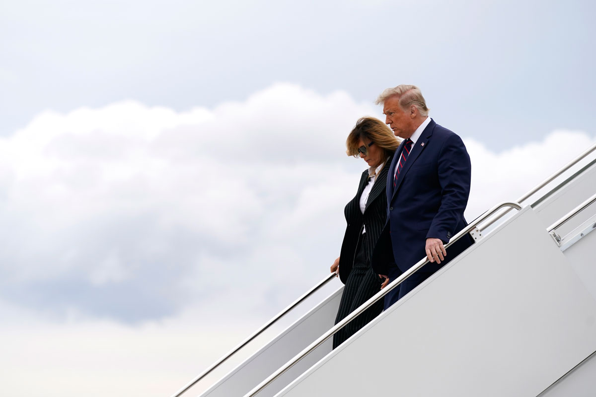 President Donald Trump and first lady Melania Trump arrive at Cleveland Hopkins International Airport for the first presidential debate on Tuesday, September 29.