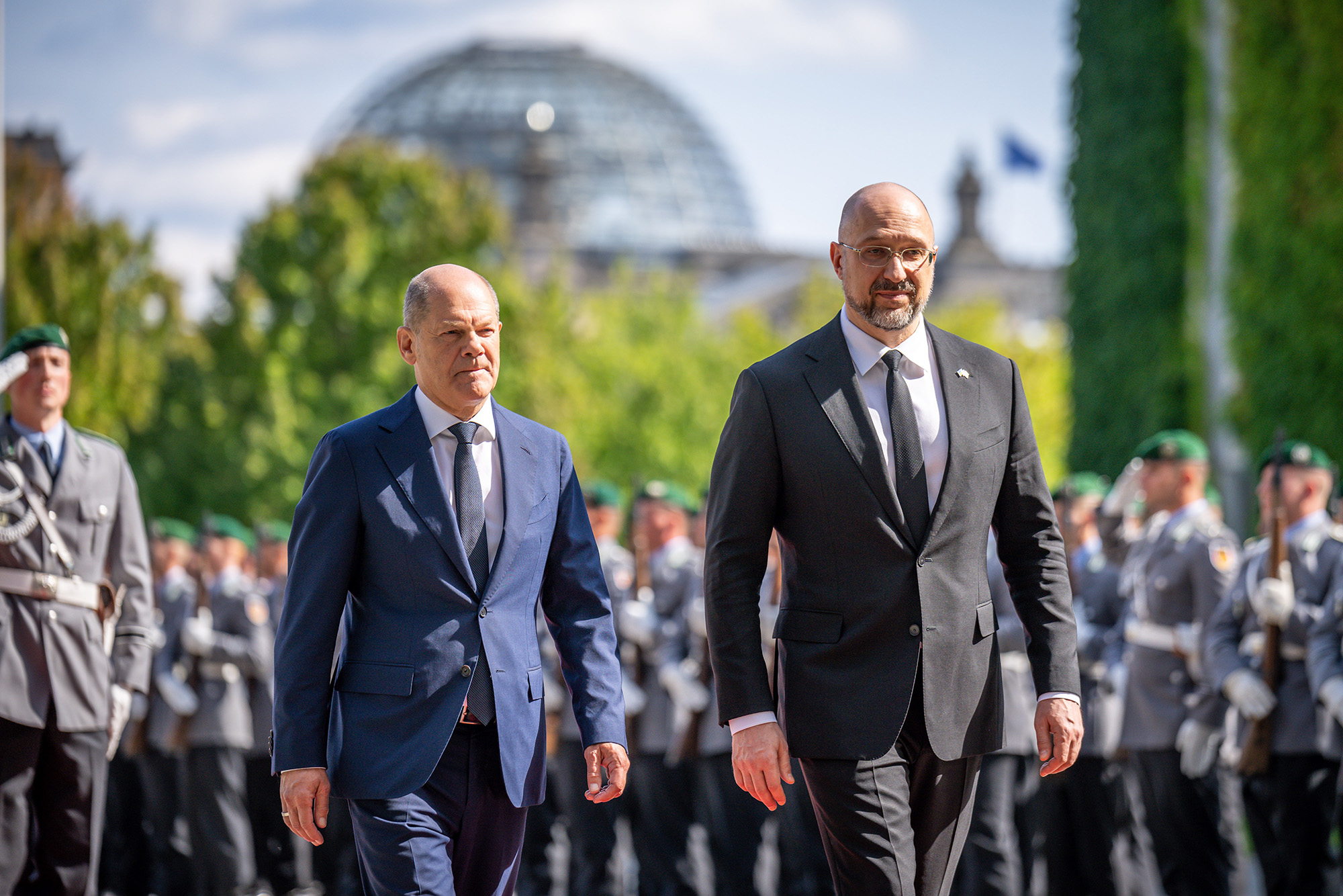 German Chancellor Olaf Scholz greets Denys Schmyhal, Prime Minister of Ukraine, for a reception with military honors at the Chancellery, Berlin, Germany, on September 4. 