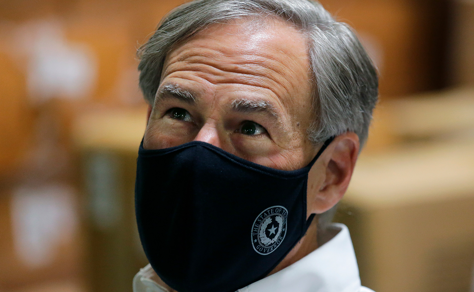 Texas Gov. Greg Abbott visits a Texas Division of Emergency Management Warehouse filled with Personal Protective Equipment on Tuesday in San Antonio.