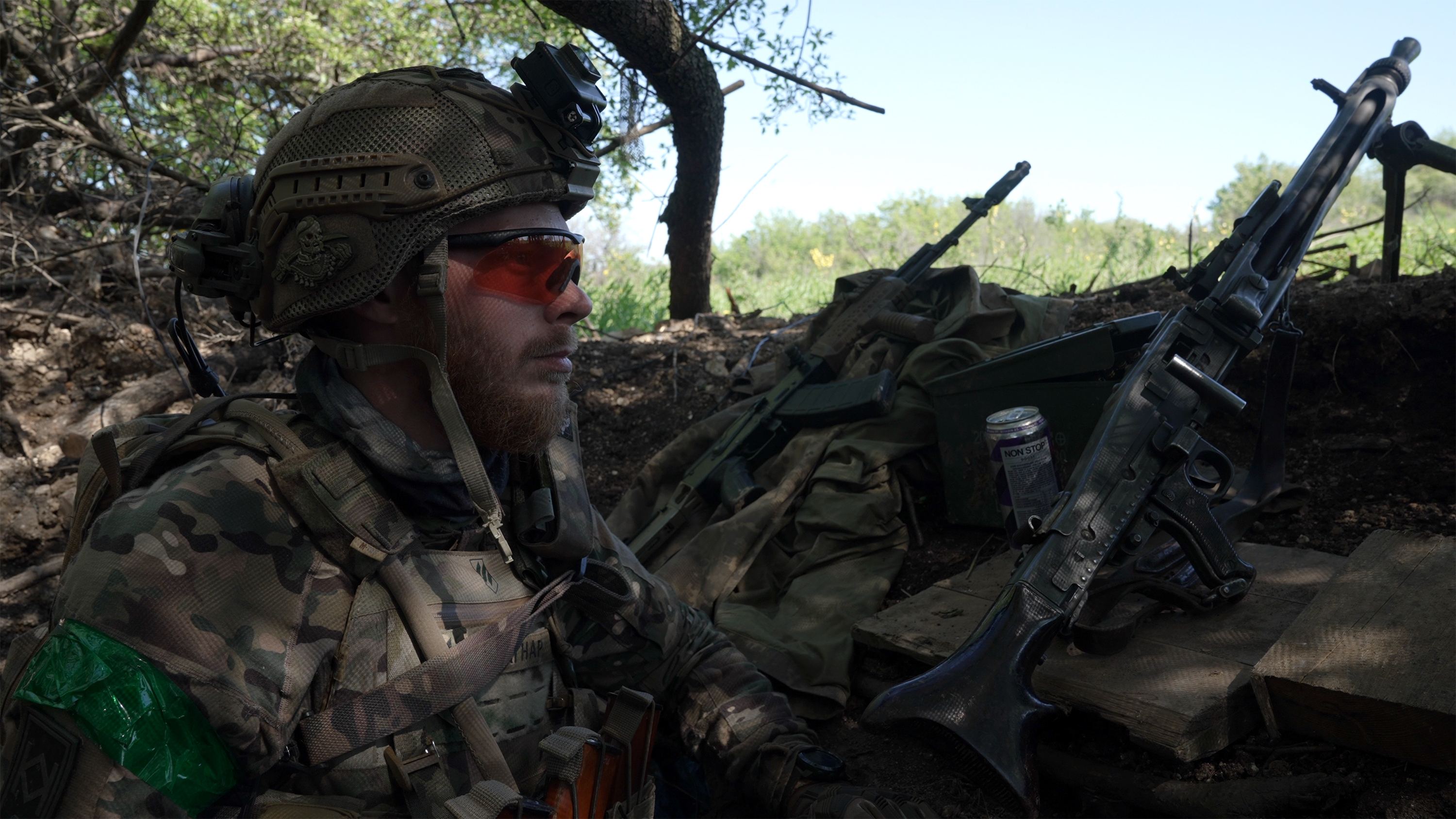 A machine gunner with Ukraine’s 3rd Assault Brigade keeps watch on the frontlines outside of Bahkmut. 