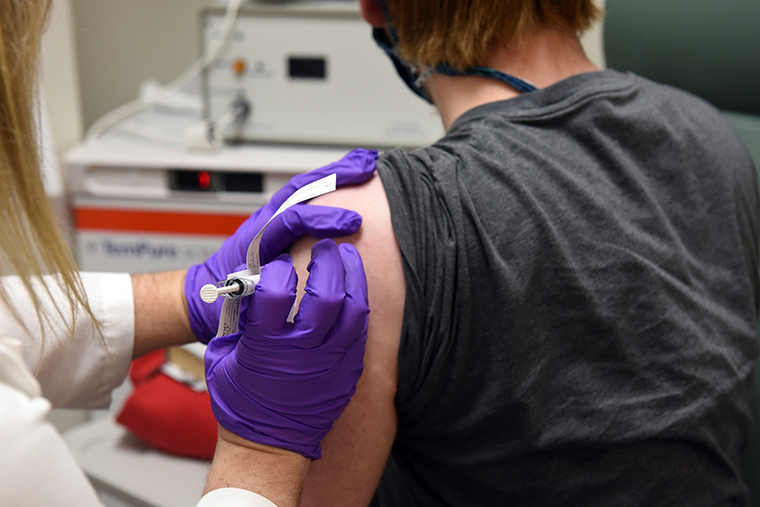 A patient enrolled in Pfizer's Covid-19 program participates in a vaccine clinical trial at the University of Maryland School of Medicine in Baltimore on May 4.