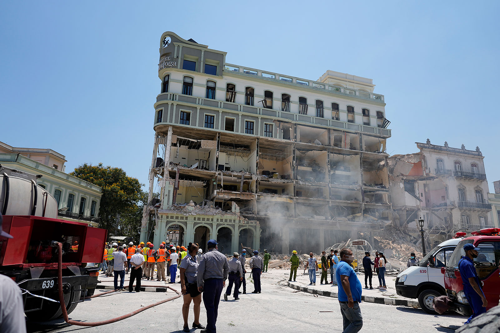 Rooms are seen exposed at the Hotel Saratoga where emergency crews work after a deadly explosion in Havana, Cuba, on Friday, May 6.