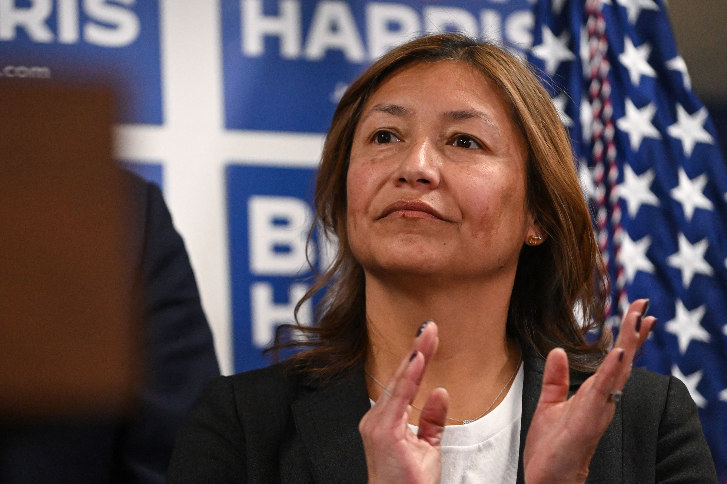 President Joe Biden's 2024 campaign manager Julie Chavez Rodriguez applauds at the Biden for President 2024 campaign headquarters on February 3 in Wilmington, Delaware.