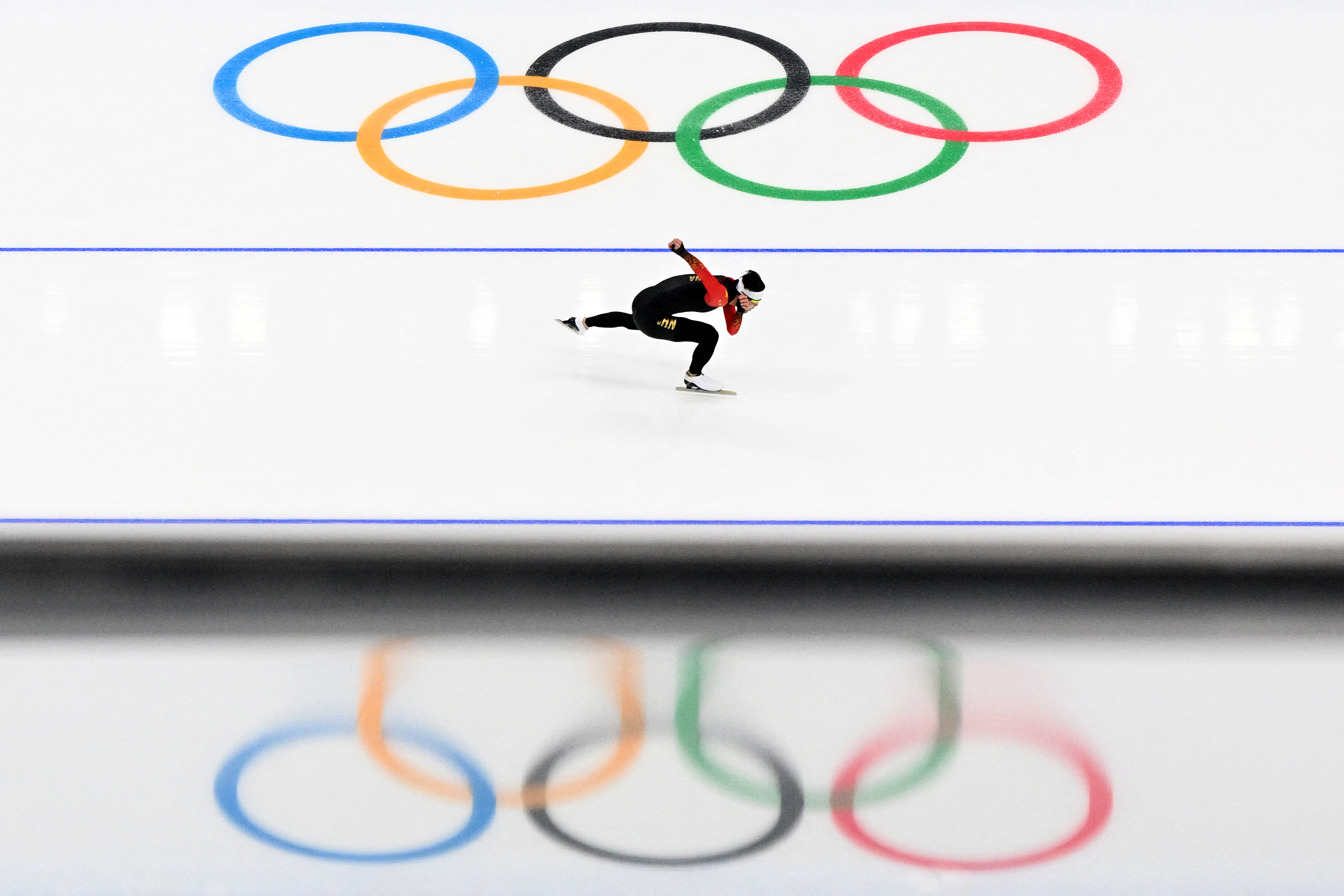 A Chinese athlete warms up before a speed skating event on February 13. 