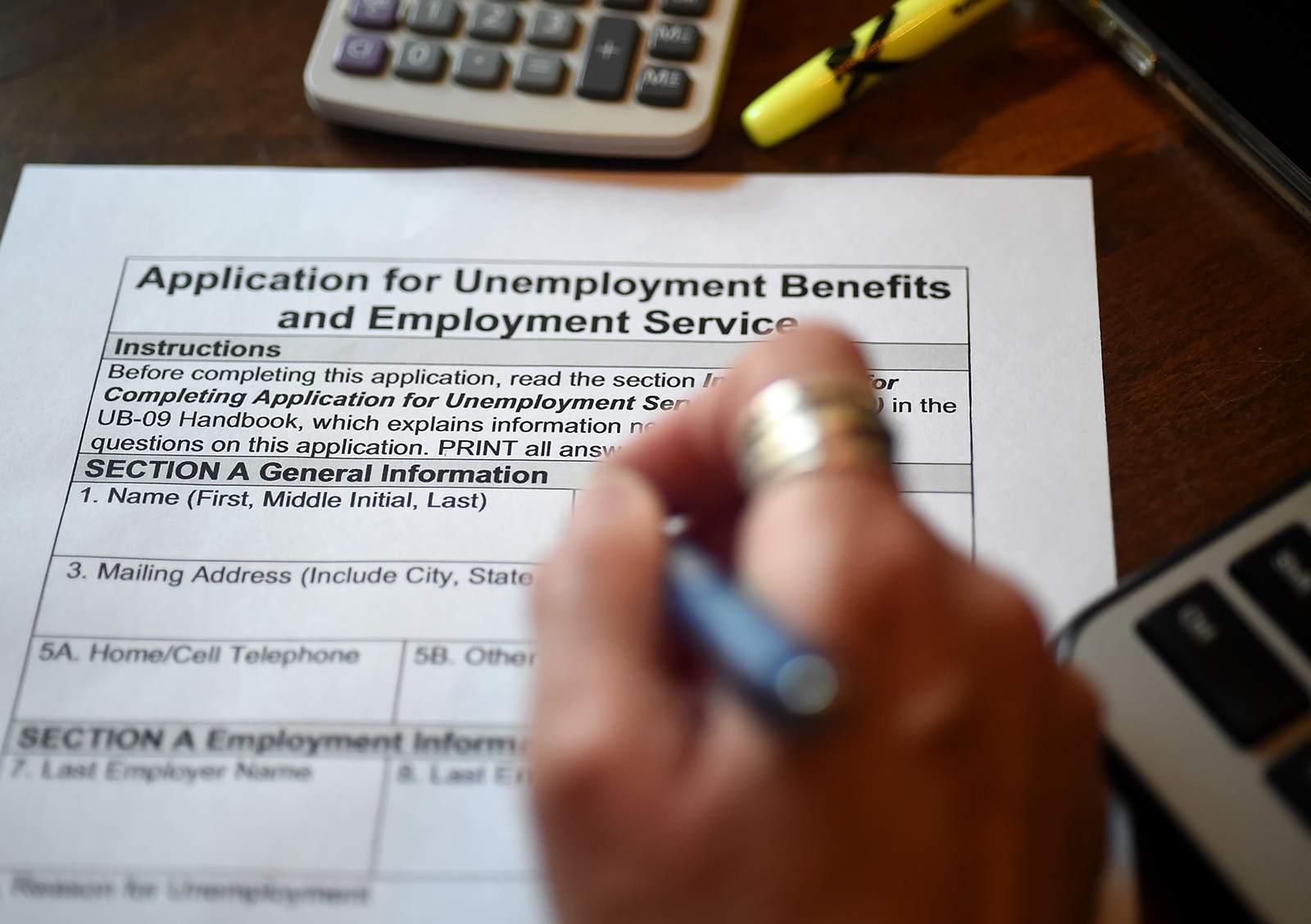 A person files an application for unemployment benefits on April 16, 2020, in Arlington, Virginia.