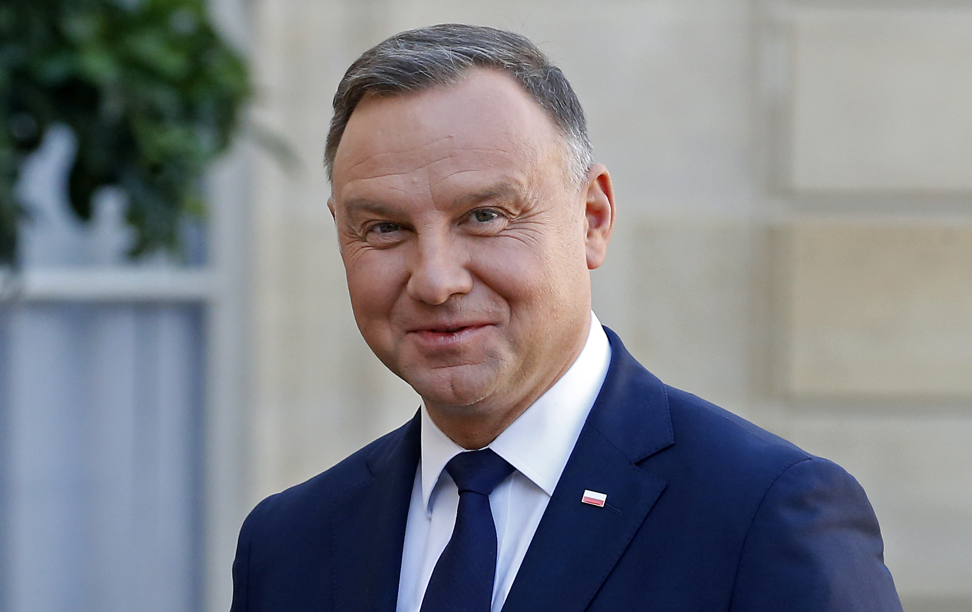 Andrzej Duda poses as he arrives for a working lunch with French President Emmanuel Macron in Paris on October 27, 2021.