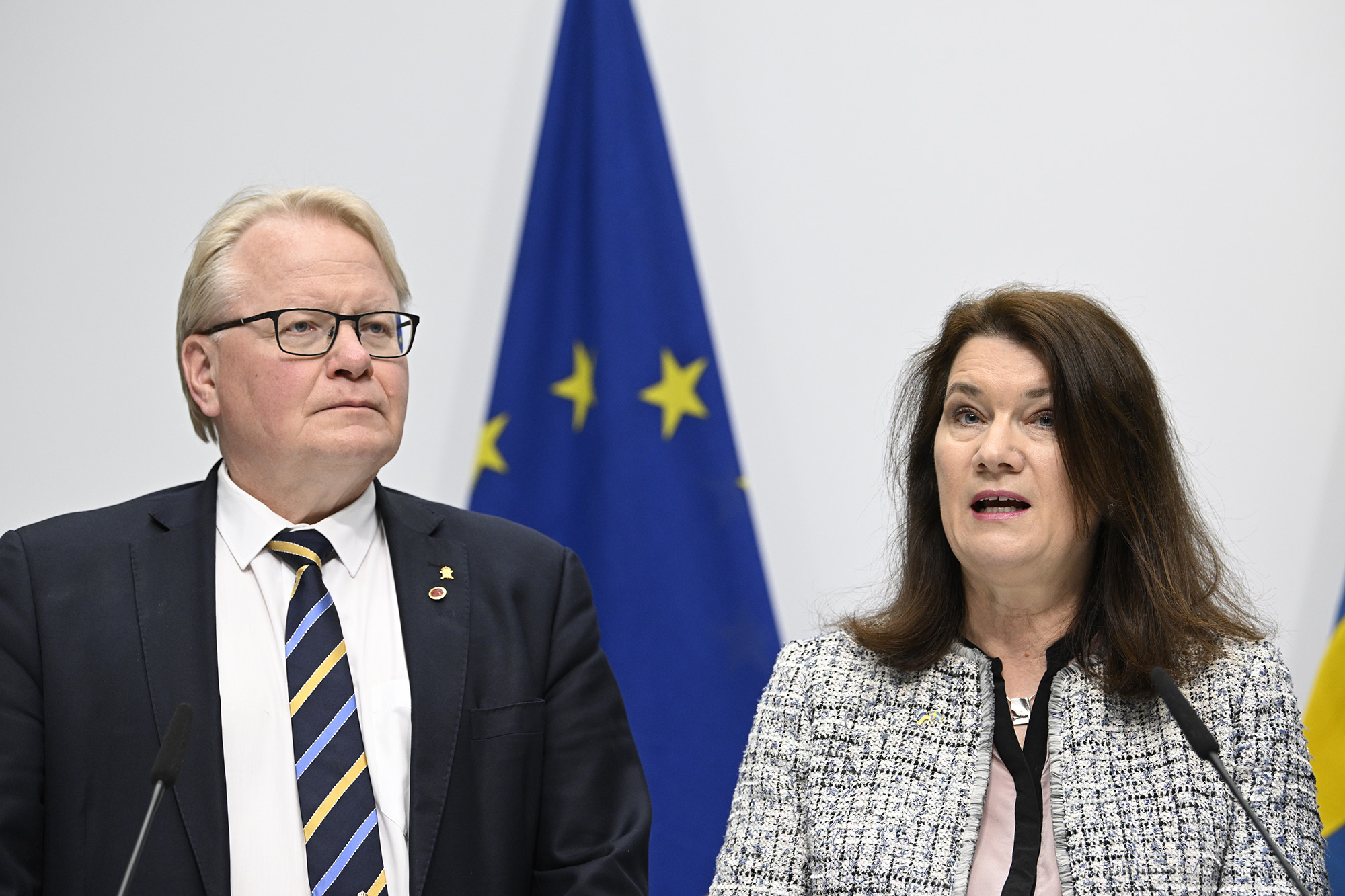 Minister of Defense Peter Hultqvist, left, and Minister of Foreign Affairs Ann Linde present a security policy analysis during a press conference in Stockholm, Sweden, Friday, on May 13.