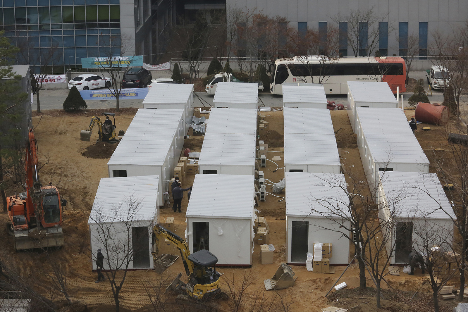 Containers used as a section for the treatment of people infected with the coronavirus will be erected on Thursday, December 10, at the site of the Seoul Medical Center in Seoul, South Korea. 