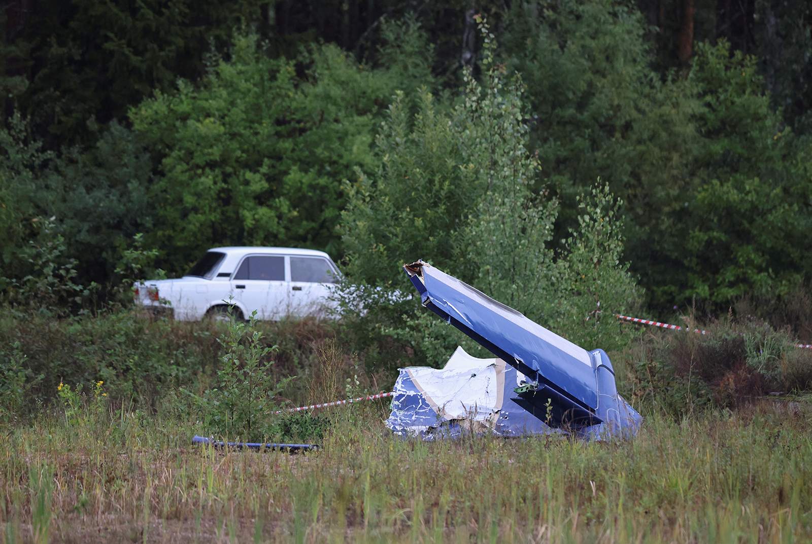 Wreckage is seen near the crash site in the Tver region, Russia, on August 24.