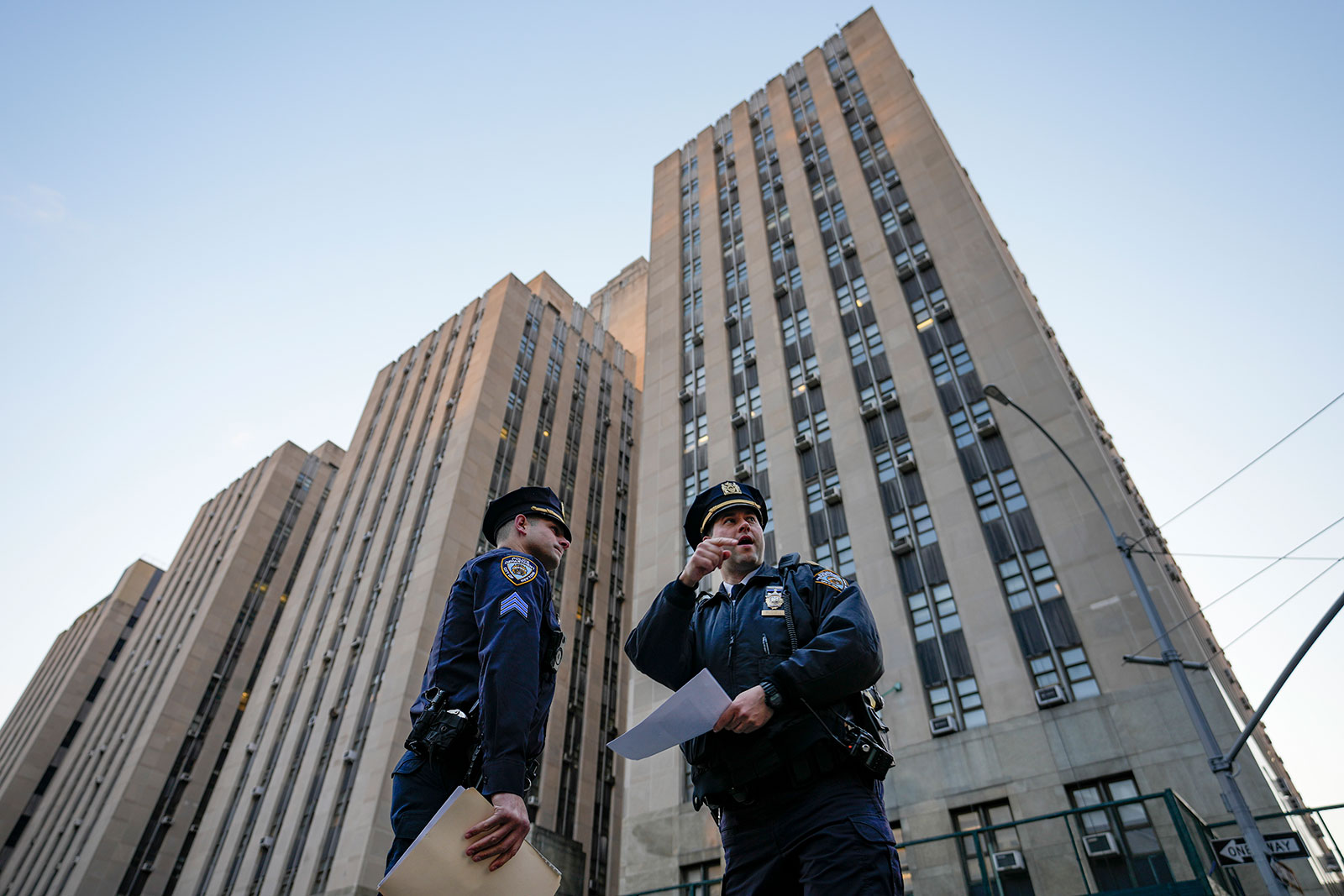 Police officers secure the perimeter outside Manhattan Criminal Court on Tuesday morning, April 4.