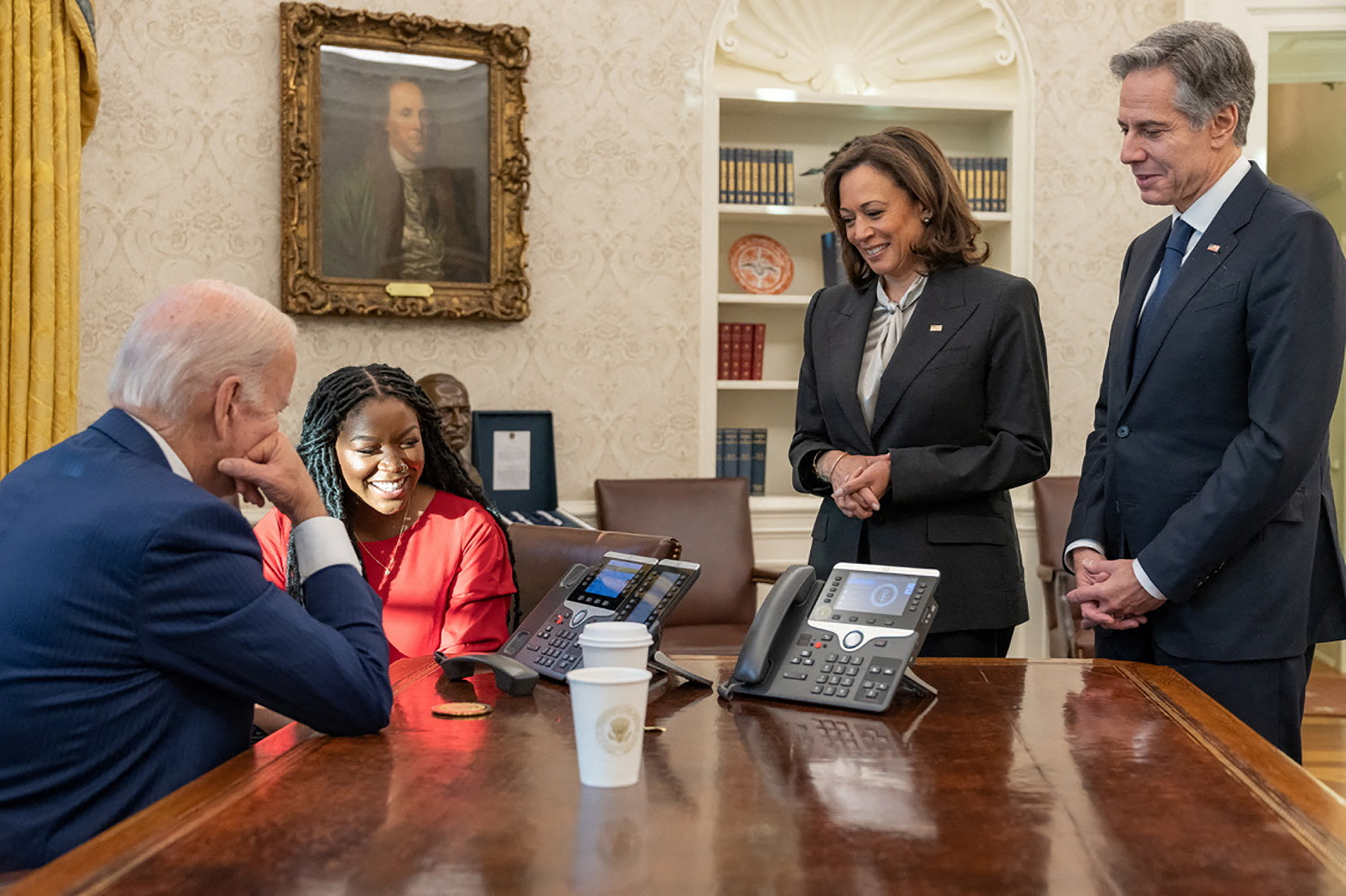 U.S. President Joe Biden and Cherelle Griner speak on the phone with WNBA basketball star Brittney Griner as Vice President Kamala Harris and U.S. Secretary of State Antony Blinken look on, at the White House in Washington, U.S. on December 8.