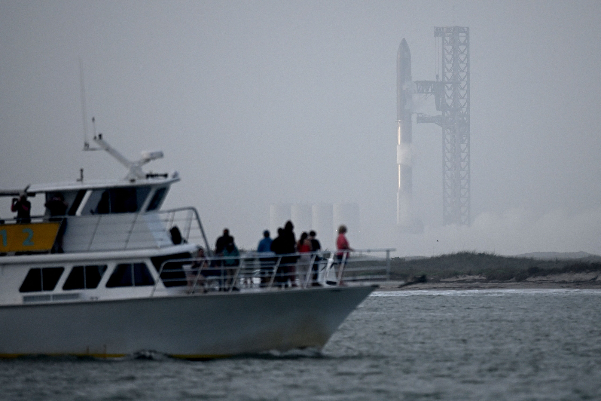 Spectator wait for the launch of the SpaceX Starship in Boca Chica, Texas, on Thursday, April 20.