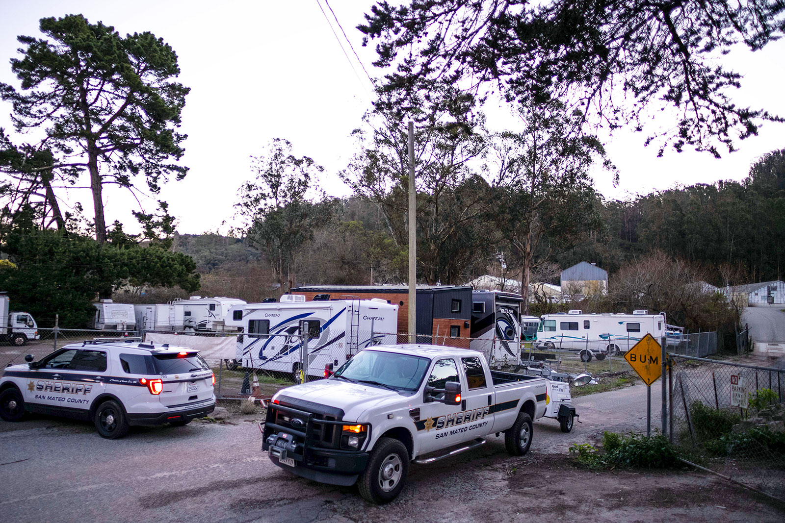 Law enforcement personnel work at the scene of shooting at Mountain Mushroom Farm on January 24.