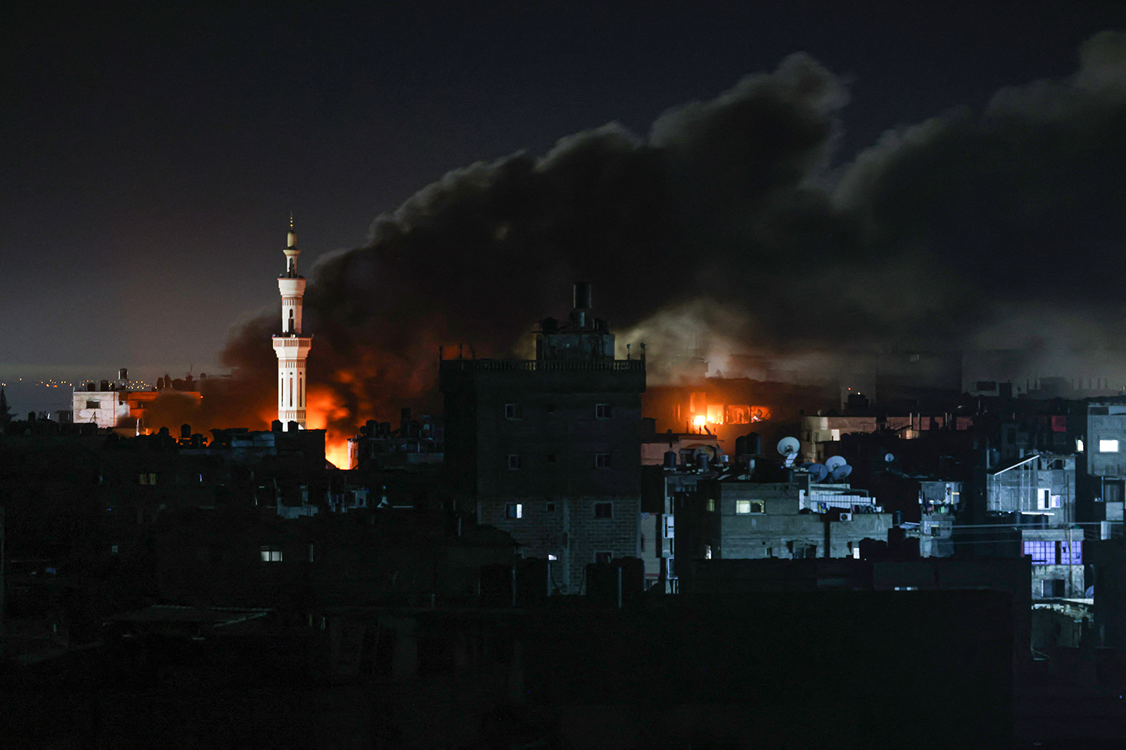 Smoke billows during Israeli bombardment over Rafah in the southern Gaza Strip on February 12.