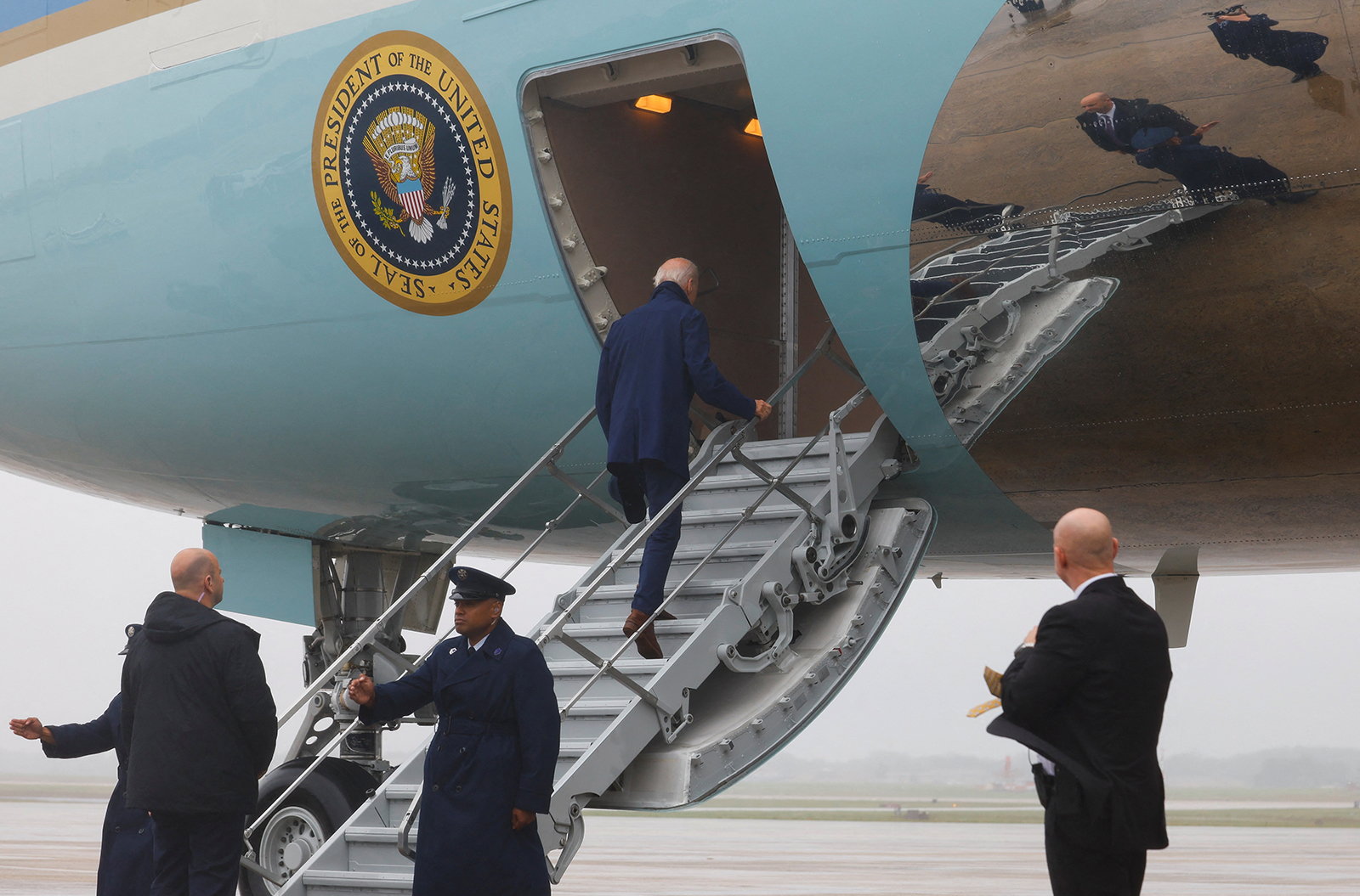U.S. President Joe Biden boards Air Force One as he departs Joint Base Andrews for Michigan where he will join striking members of the United Auto Workers on the picket line, in Maryland, on September 26.