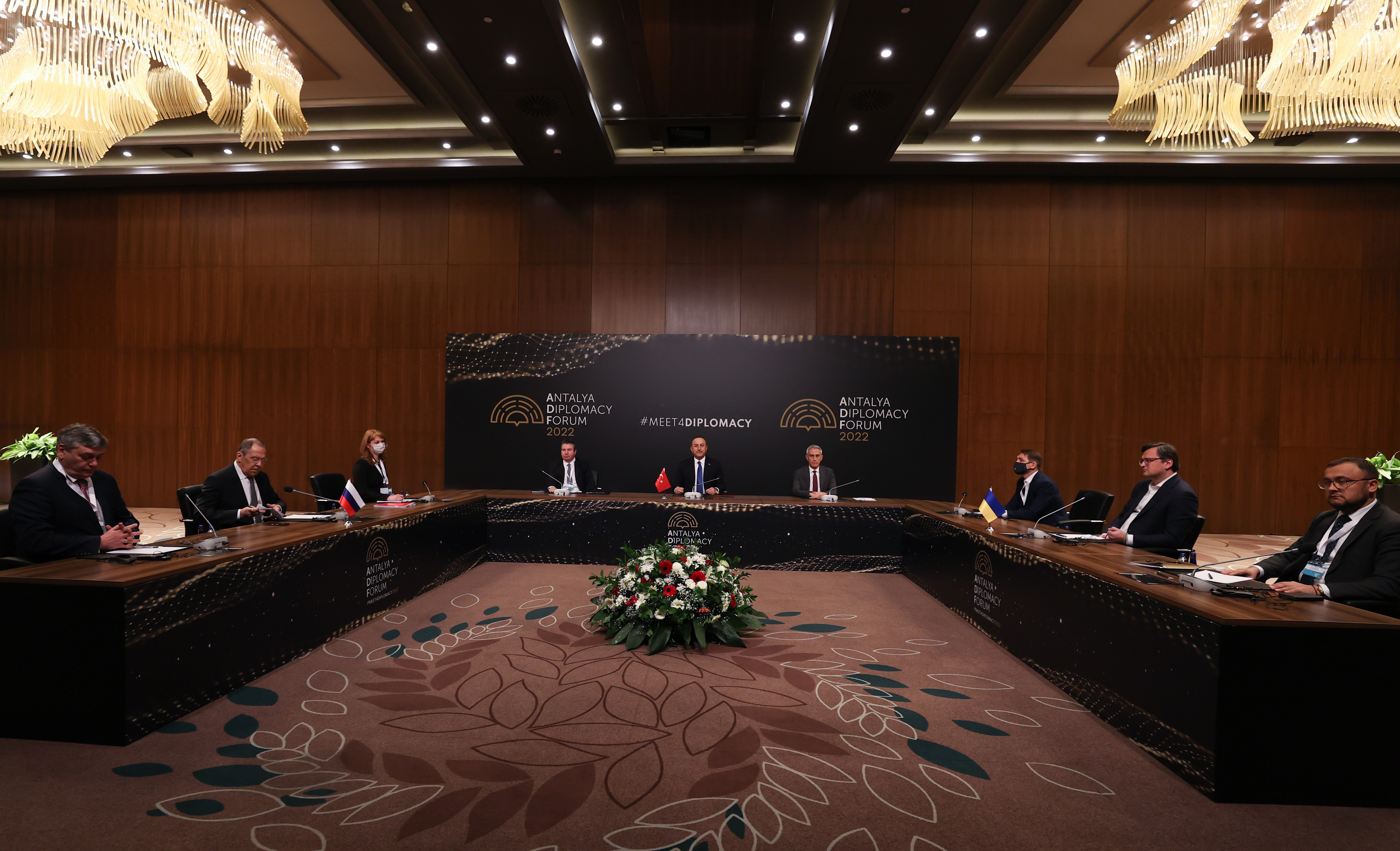 Russian Foreign Minister Sergey Lavrov and Ukraine's Foreign Minister Dmytro Kuleba attend a tripartite meeting hosted by Turkish Foreign Minister Mevlut Cavusoglu at the Antalya Diplomacy Forum in Antalya, Turkey, on March 10.