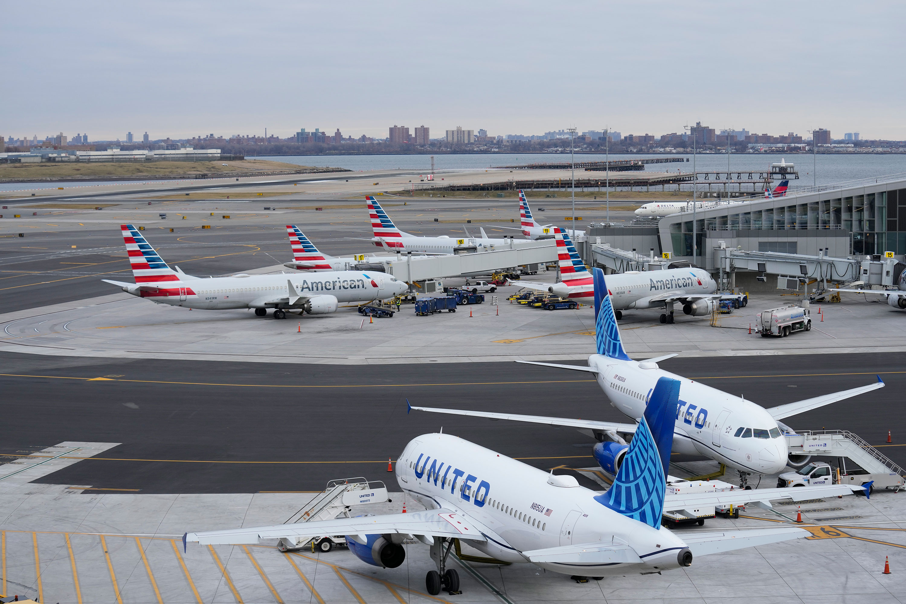 United Airlines and American Airlines jets sit on the tarmac at LaGuardia Airport in New York on Wednesday.
