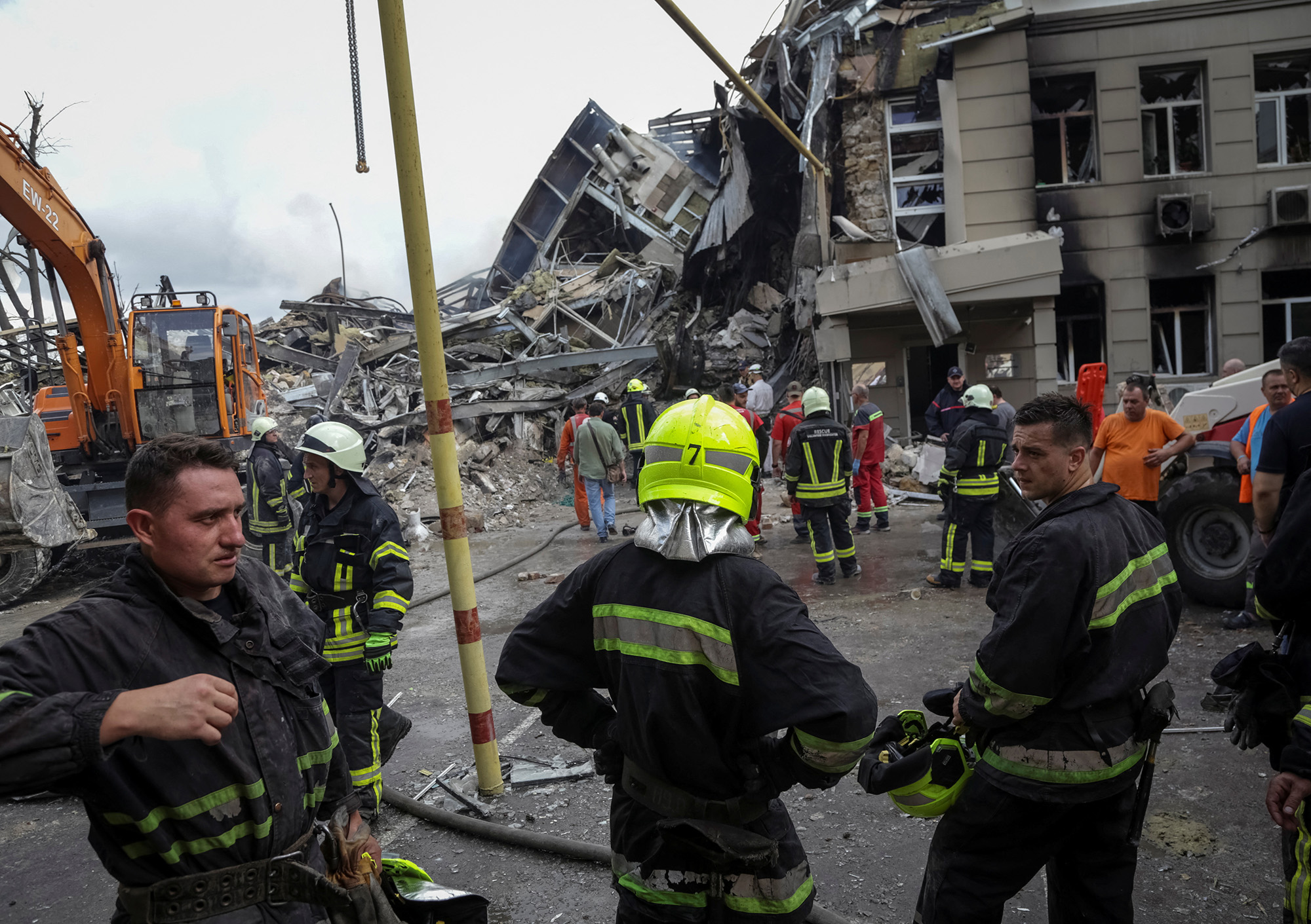 Rescuers work at a site of a building heavily damaged by a Russian missile attack in central Odesa, Ukraine, on July 20.