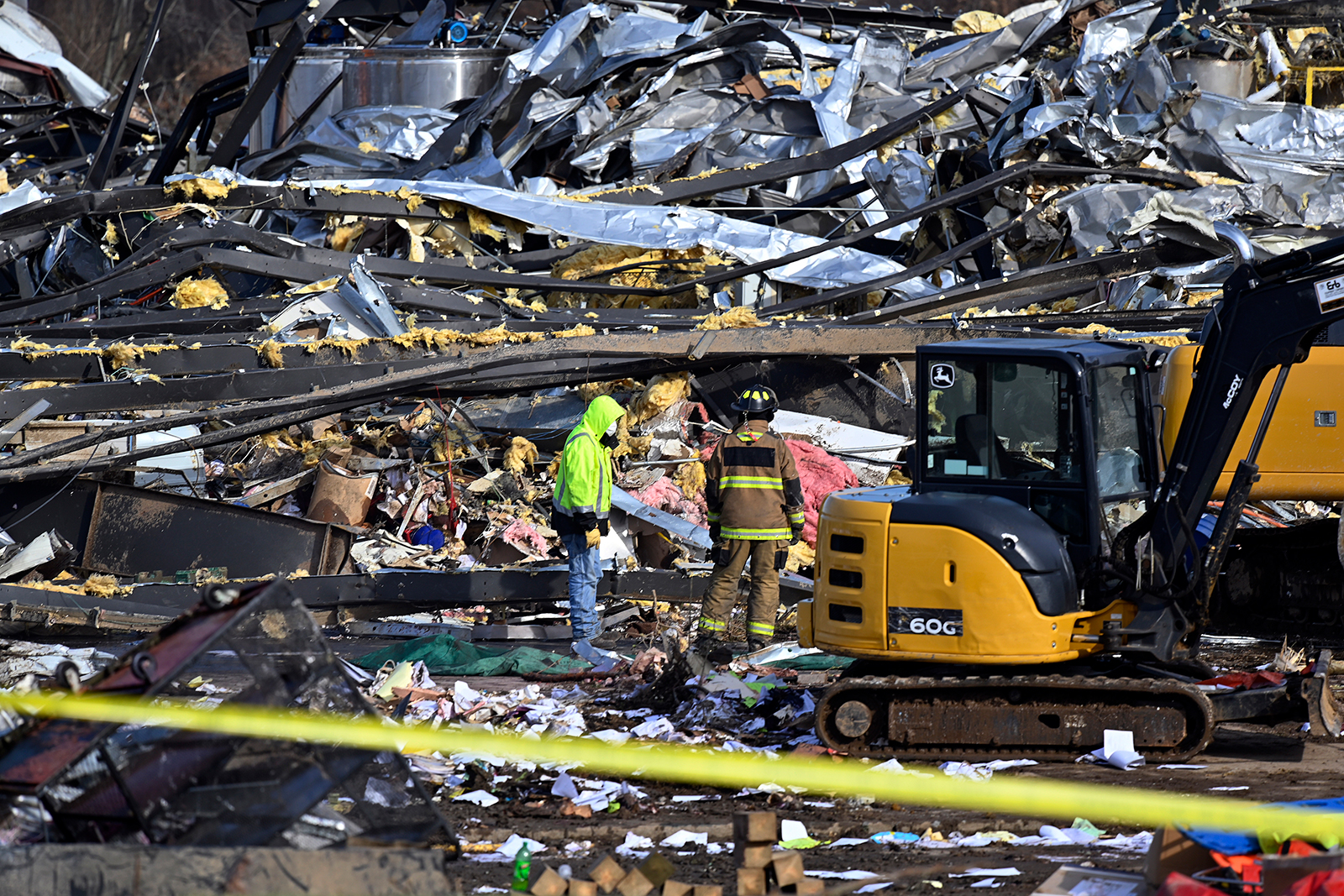 Emergency response workers dig through the rubble of the Mayfield Consumer Products candle factory in Mayfield, Kentucky, on Saturday, December 11. (Timothy D. Easley/AP)