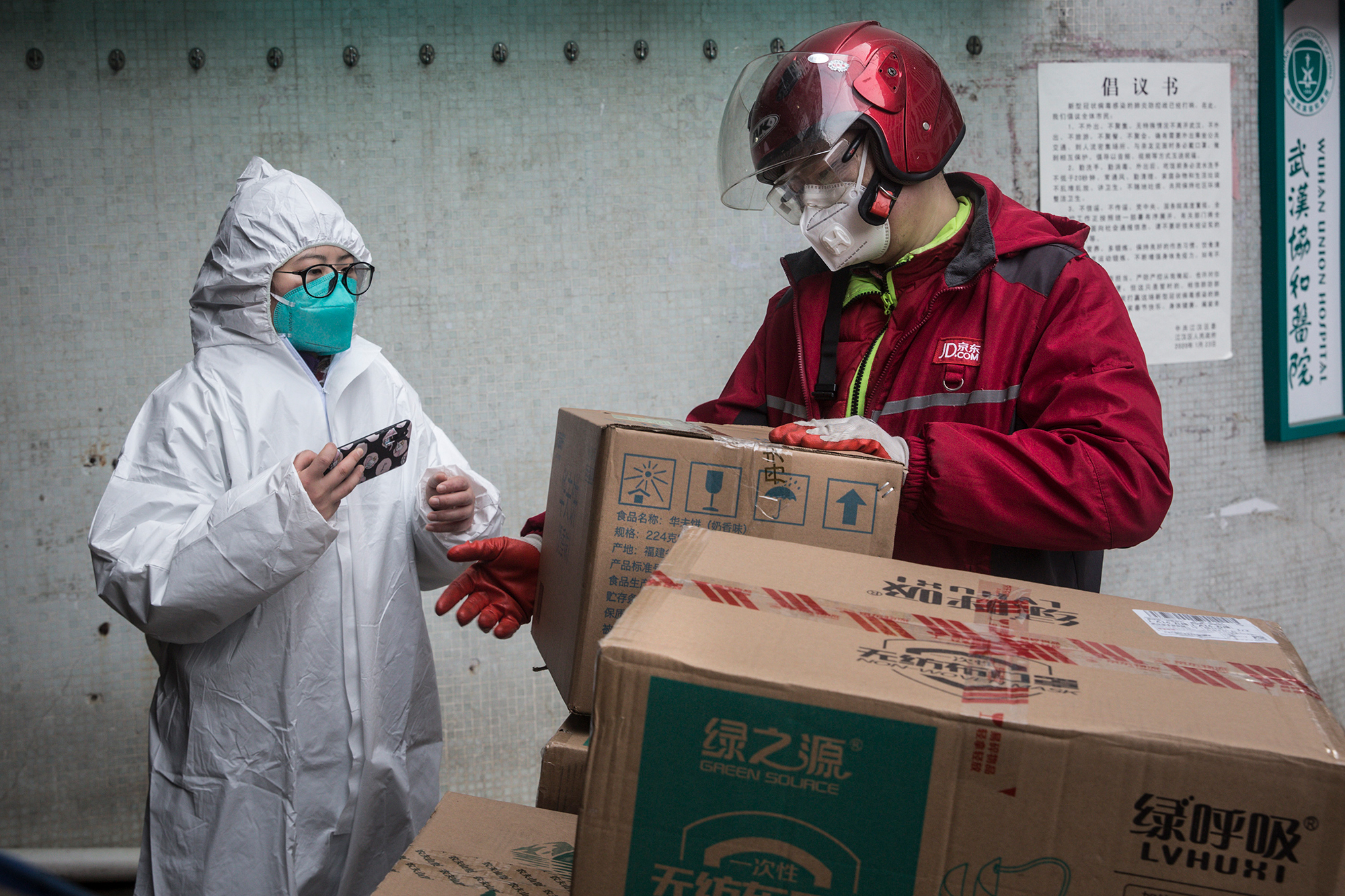 A courier delivers supplies to the Wuhan Union Hospital on January 29 in Wuhan.