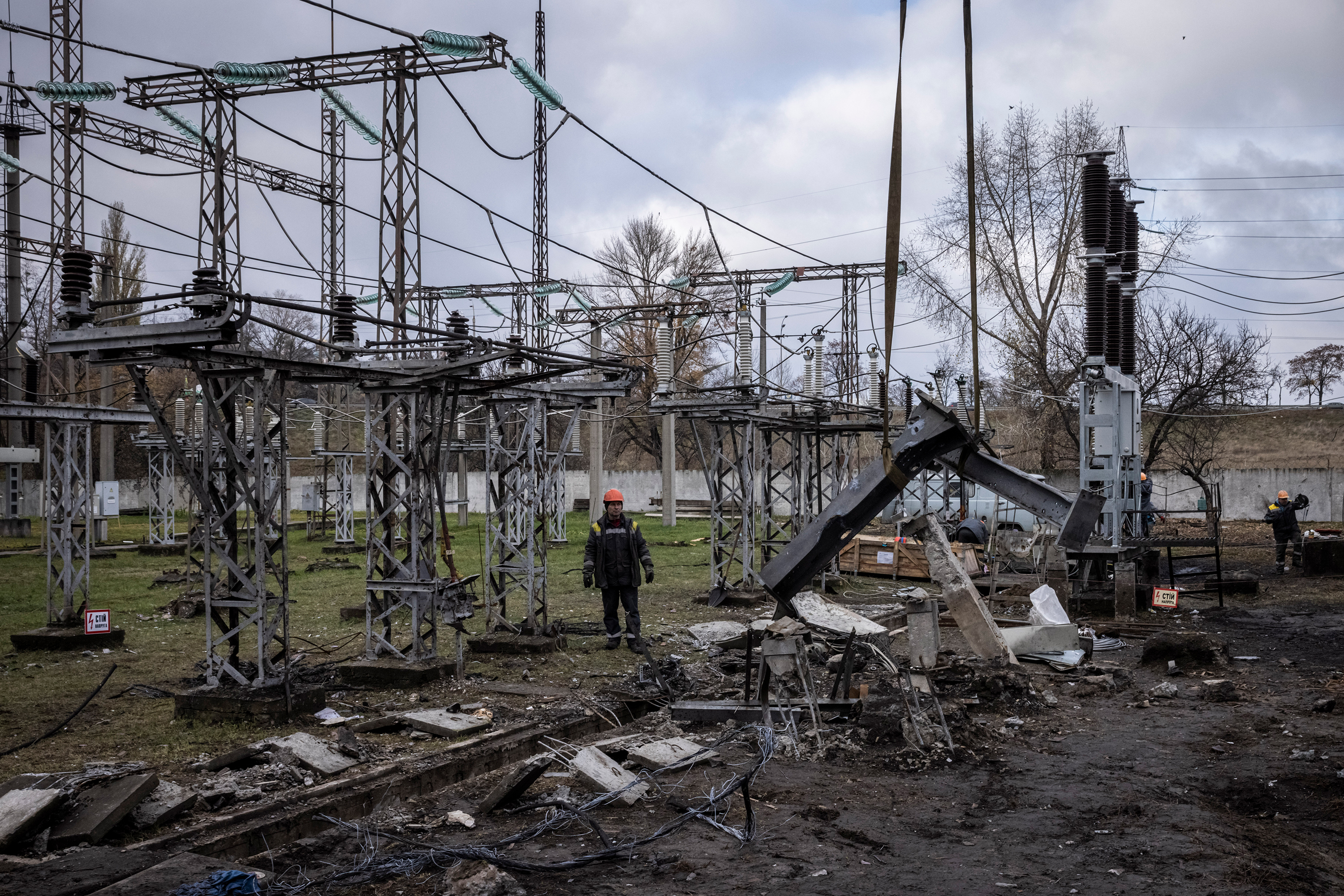 Workers repair infrastructure at a power station in Kyiv, Ukraine that was damaged by a Russian air attack in October, 2022. 