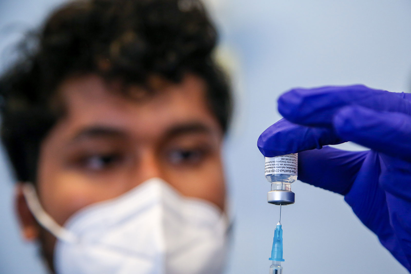 A health worker prepares a dose of the Pfizer-BioNtech Covd-19 vaccine in London on May 20.