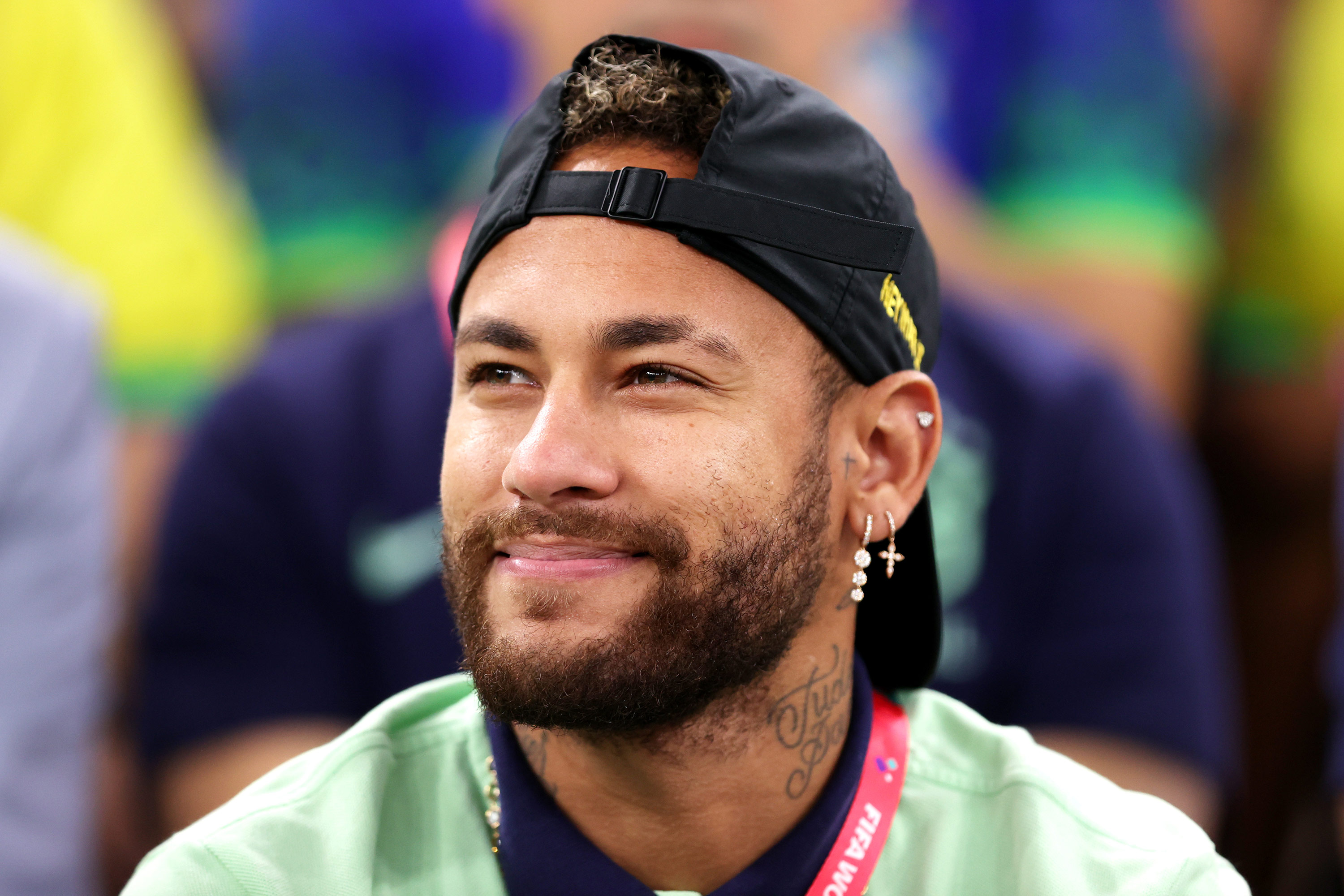 Neymar watches the World Cup match between Brazil and Cameroon on December 2. 