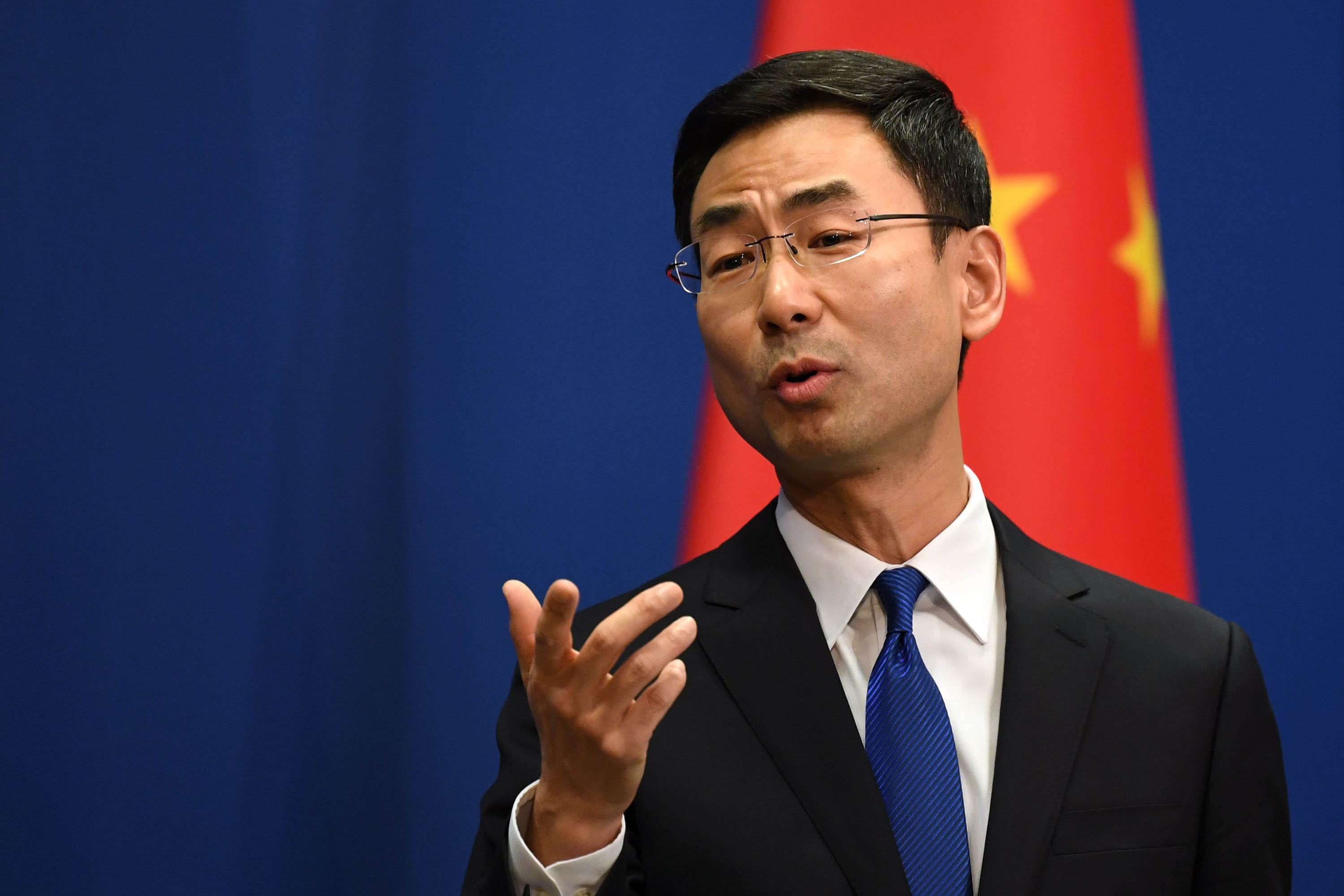 Chinese Foreign Ministry spokesman Geng Shuang speaks during a press briefing in Beijing on March 18. 