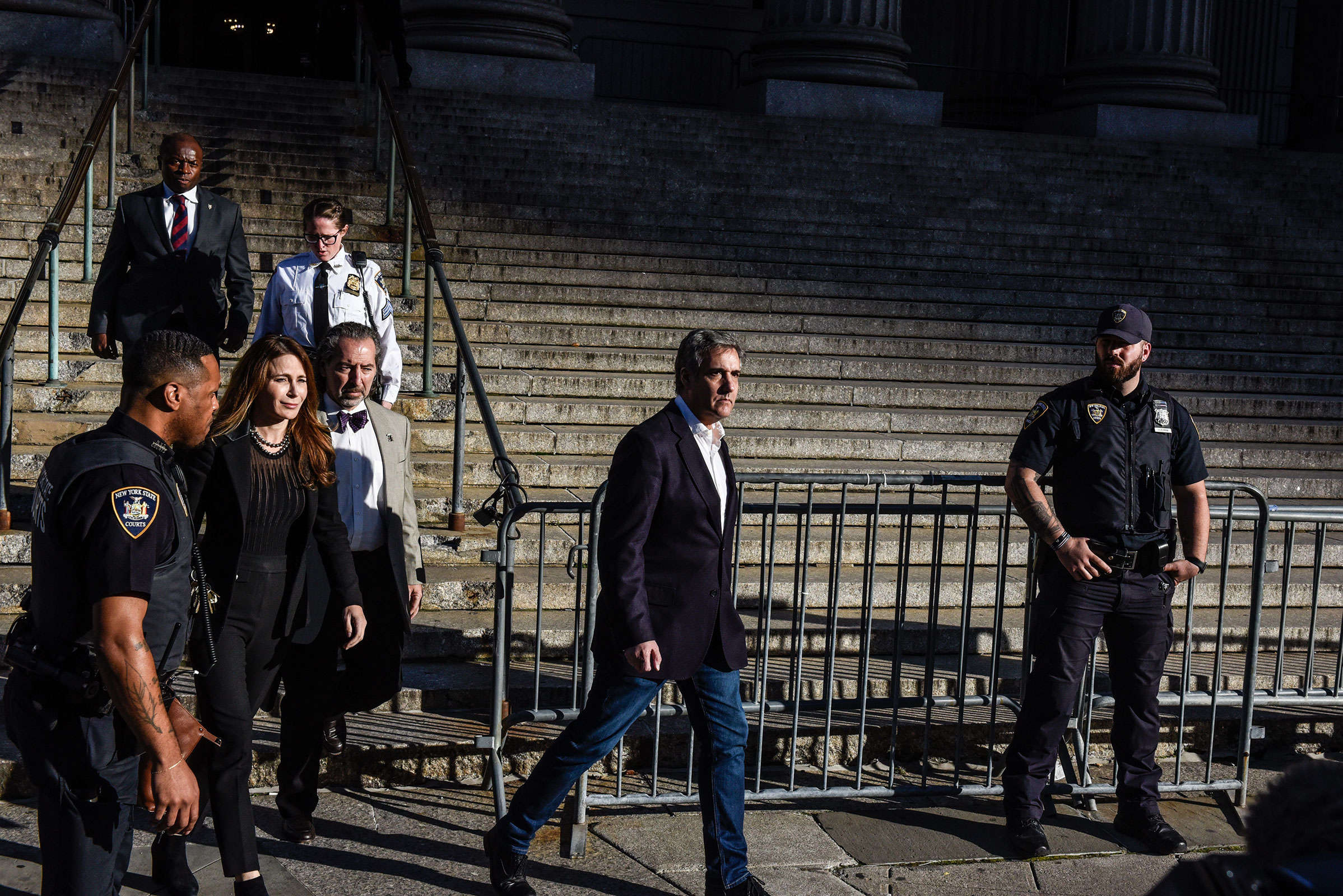 Michael Cohen, former personal lawyer to President Donald Trump, center, exits New York State Supreme Court in New York, on Wednesday, Oct. 25, 2023. 