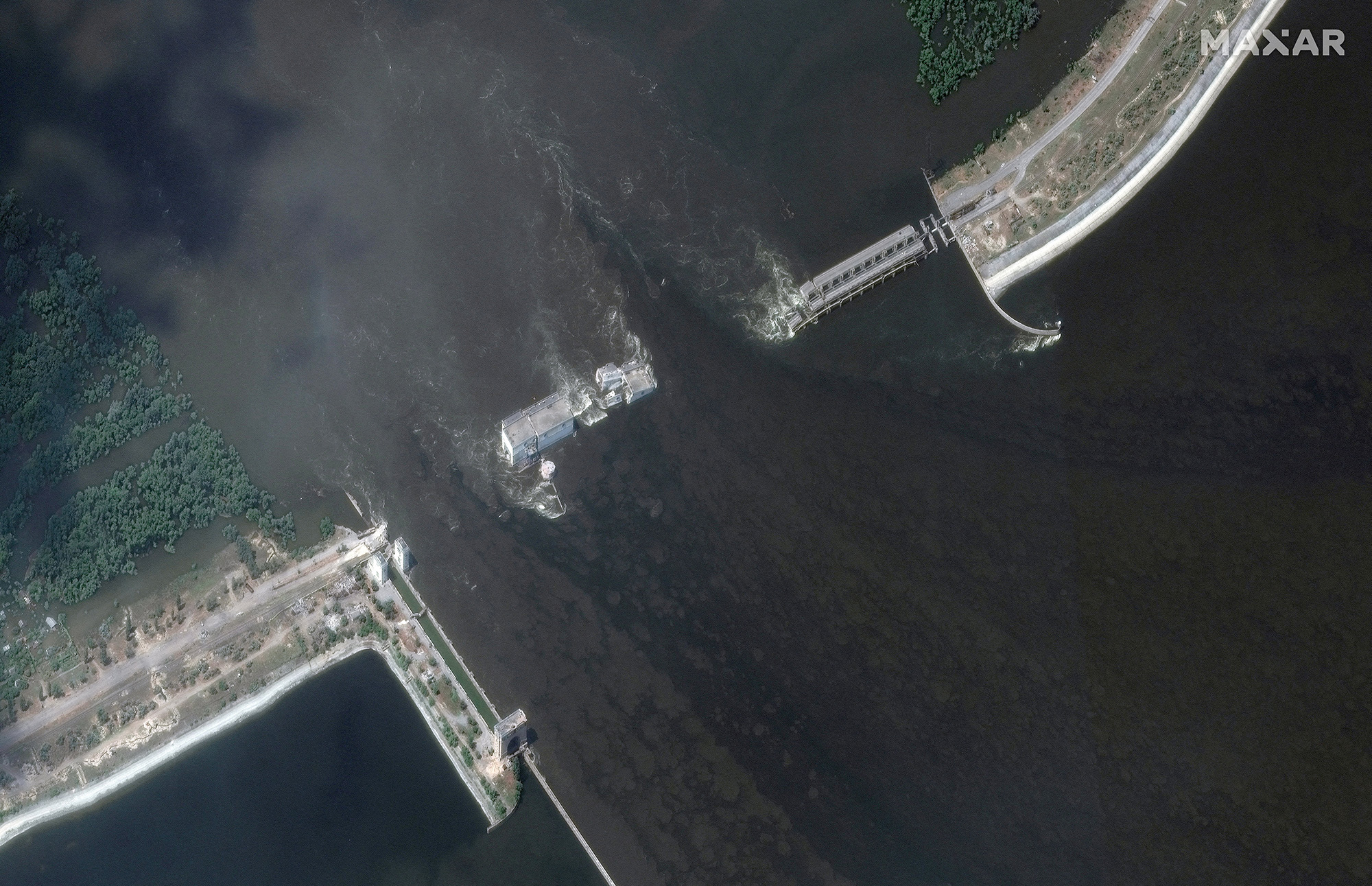 A satellite image shows the Nova Kakhovka Dam and hydroelectric plant after its collapse, in Nova Kakhovka, Ukraine, on June 7. 