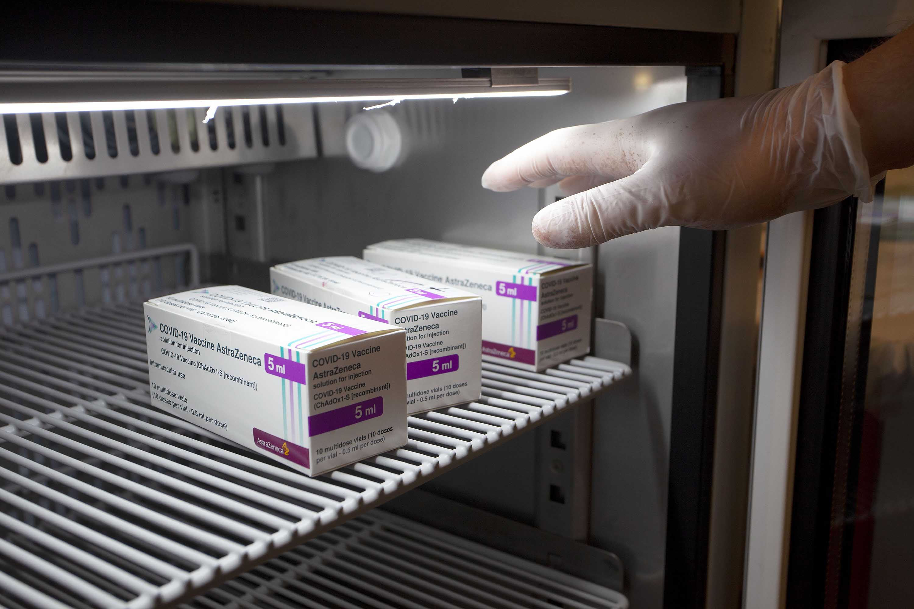 Boxes containing doses of the Astrazeneca vaccine are pictured inside a refrigerator in Bari, Italy, on March 9. 