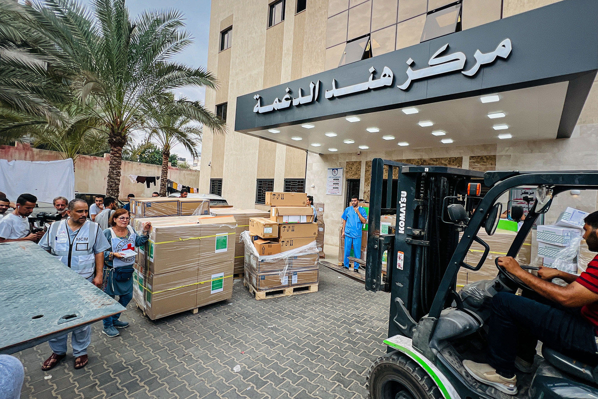 Members of the International Committee of the Red Cross (ICRC) deliver medical aid to the Nasser Medical Hospital in Khan Younis, Gaza, on October 29.